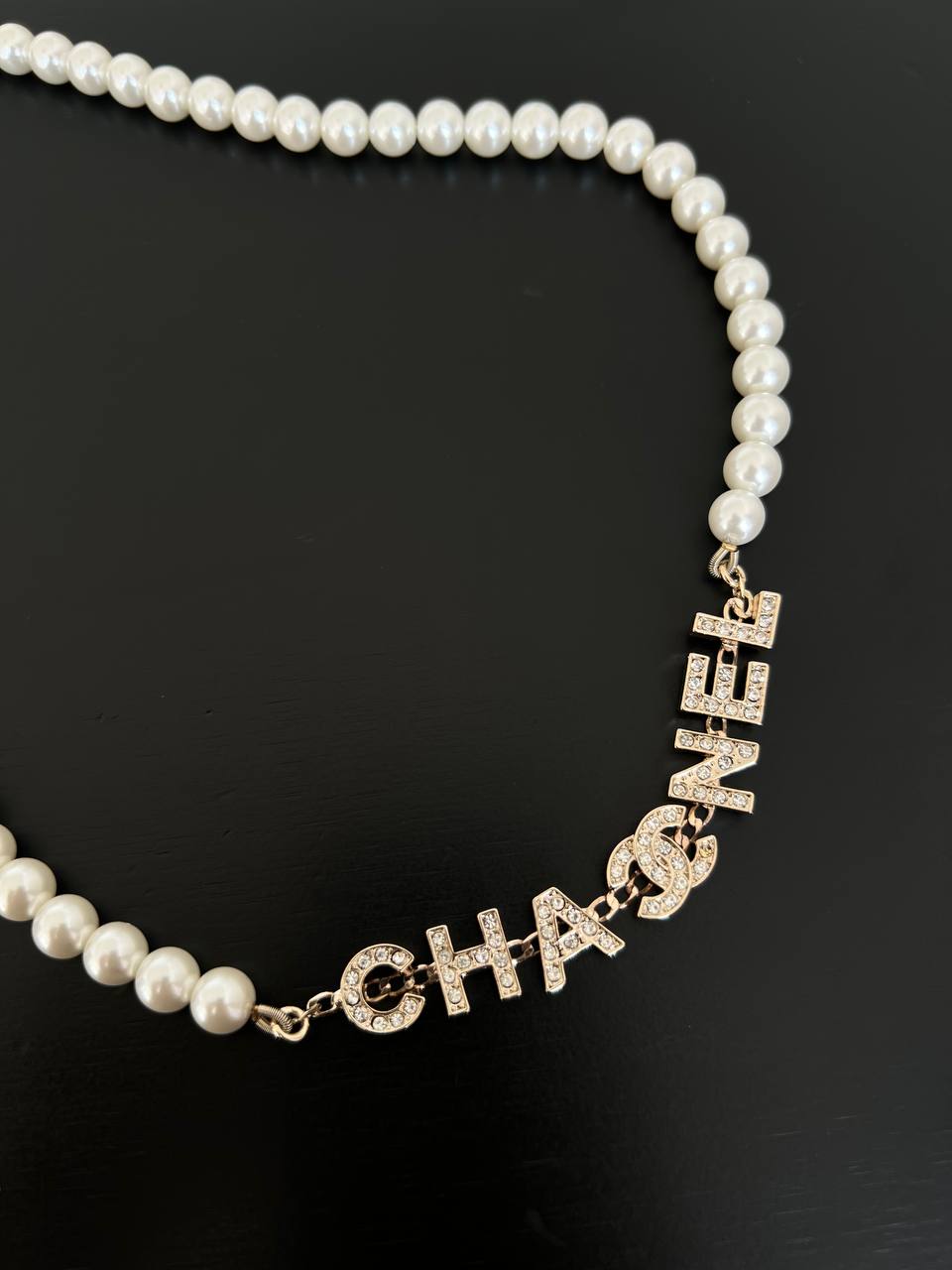Chanel White Pearl Long Necklace With Crystal Encrusted Letter Logo