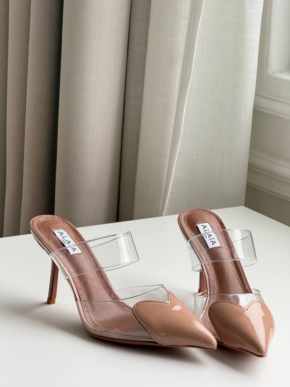 ALAÏA Heart PVC & Patent Leather Pointed-Toe Mules Nude