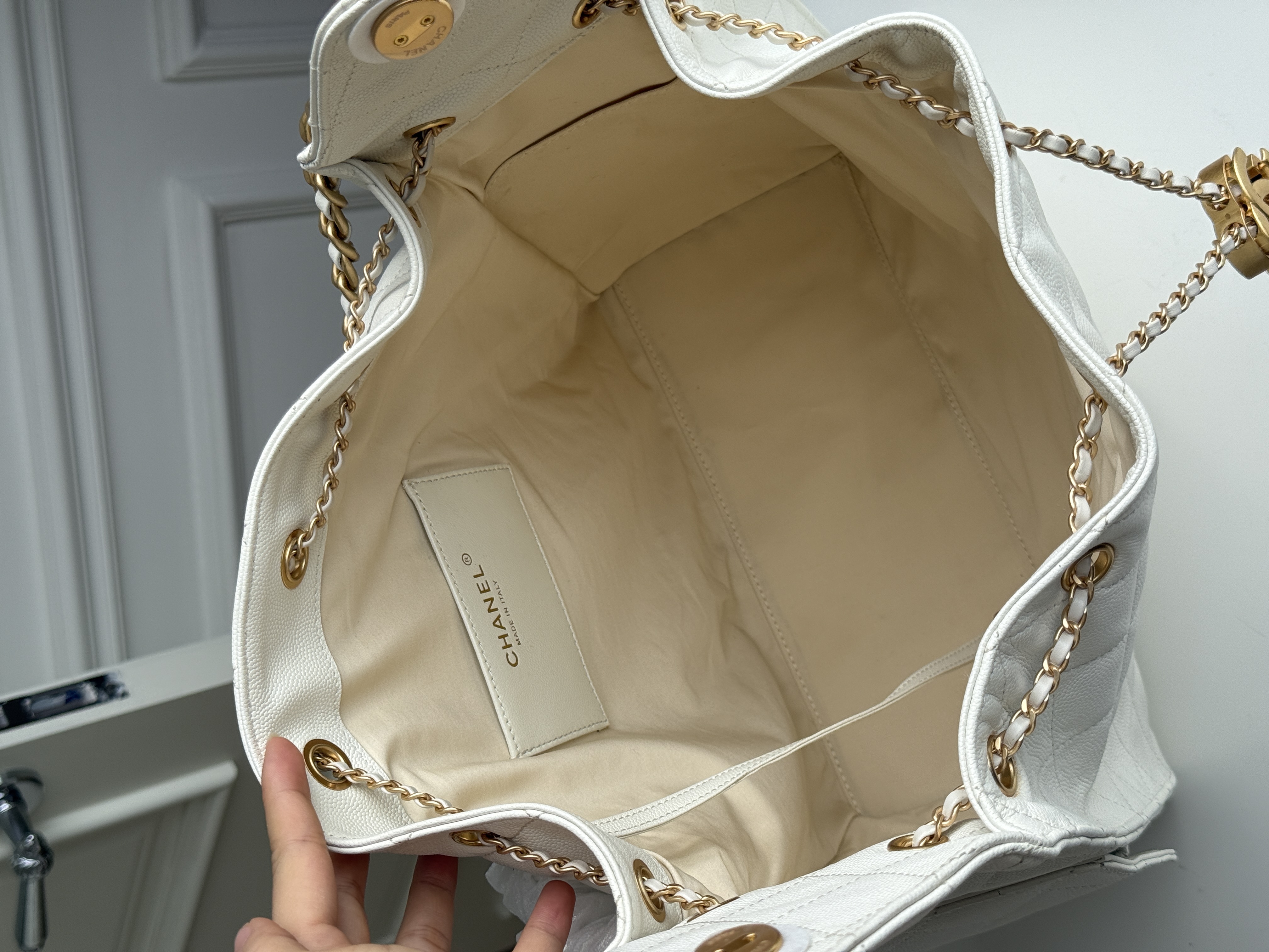 CHANEL Quilted Drawstring Bucket Bag in Milky White