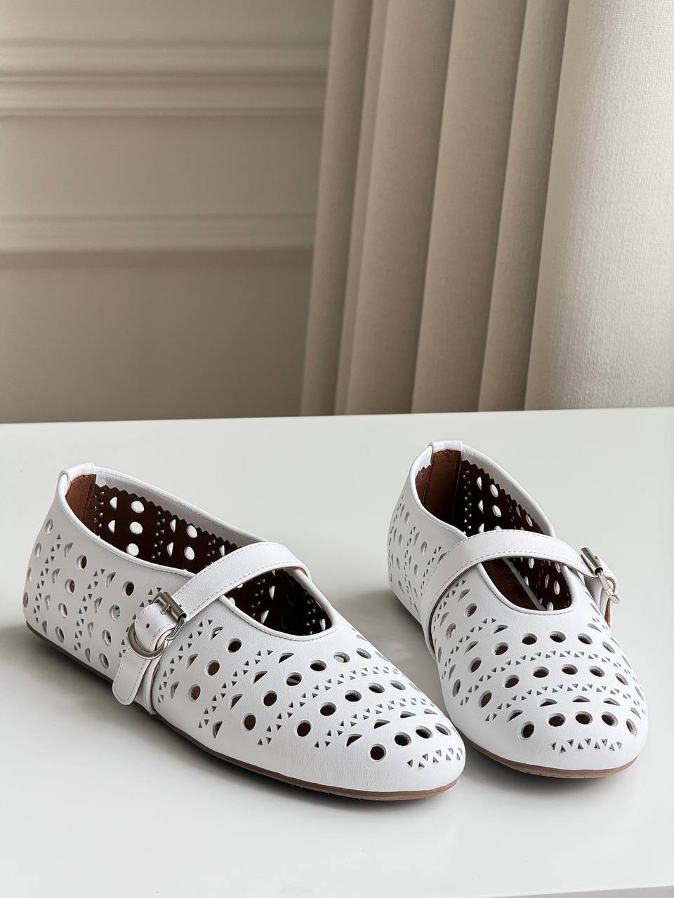 ALAÏA Vienne Laser-Cut Leather Mary Jane Ballerina Flats
