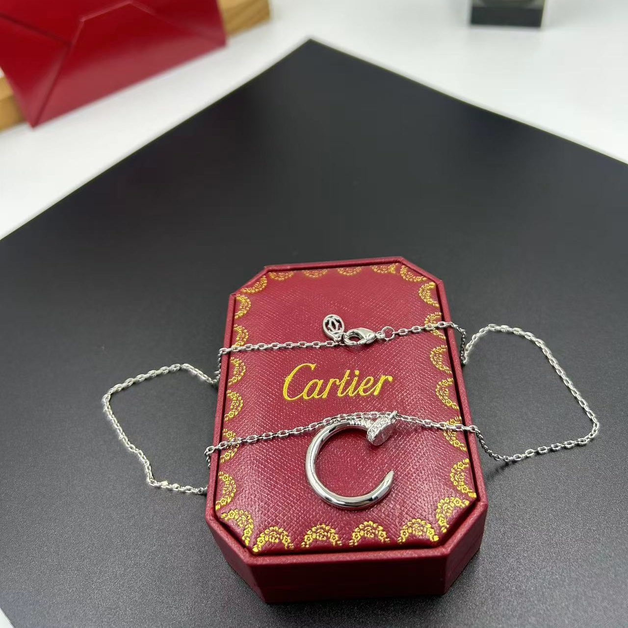 CARTIER C-SHAPED DIAMOND NECKLACE