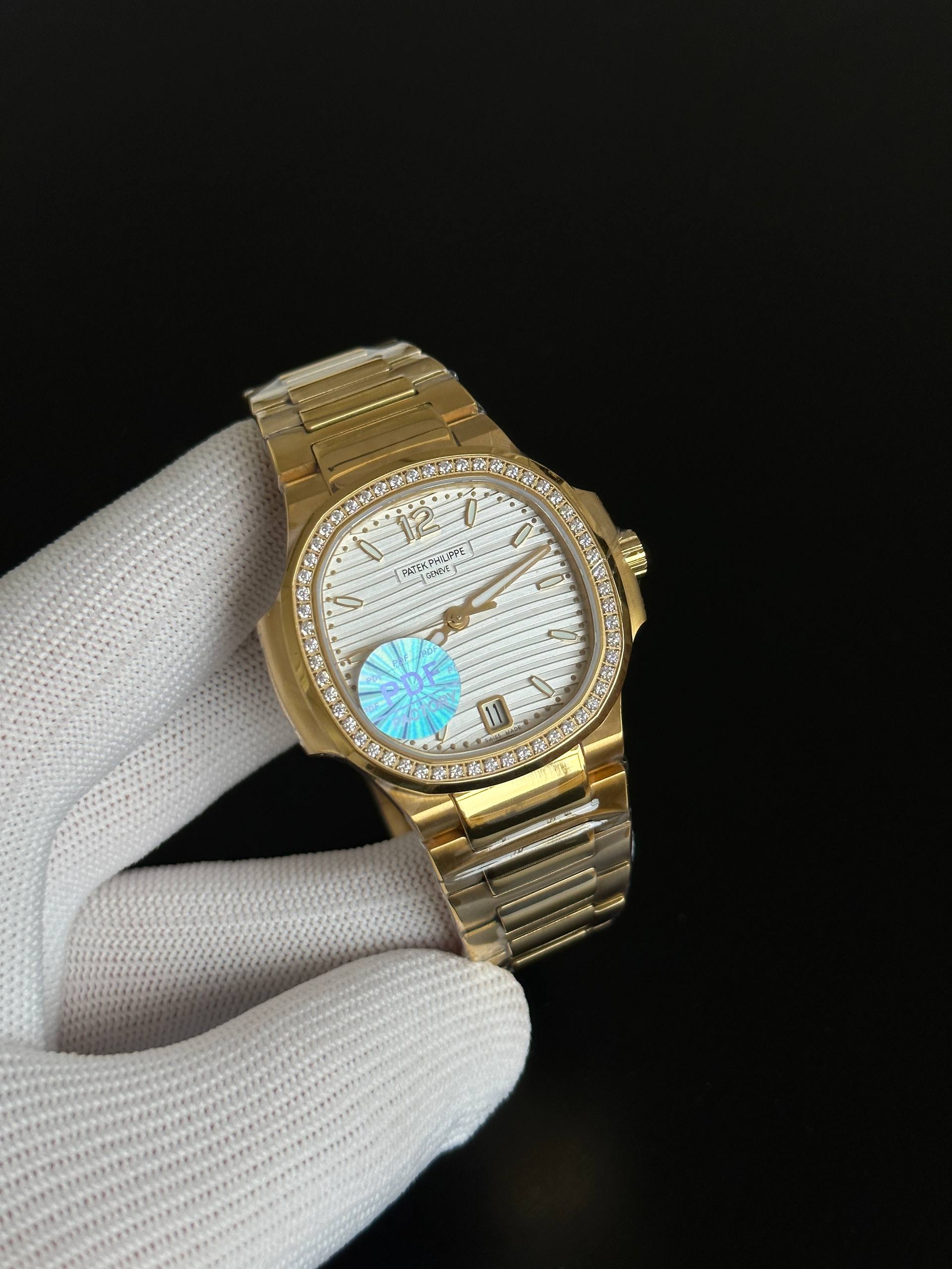 Patek Philippe Nautilus Full Yellow Gold Diamond Bezel White Dial Automatic Watch