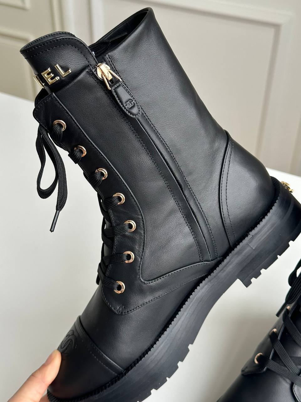 Chanel CC Embossed Leather Lace-Up Combat Boots