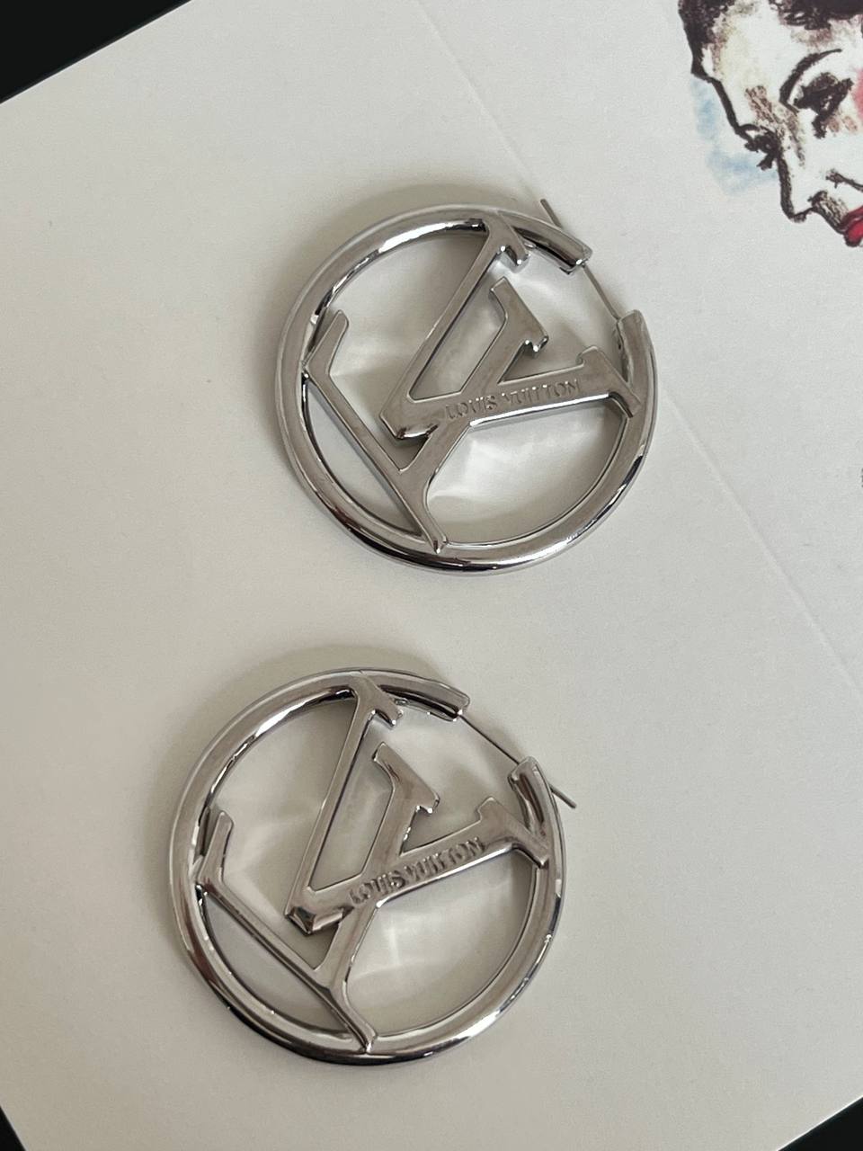 Louis Vuitton Silver-tone Hollow LV Circle Hoop Earrings