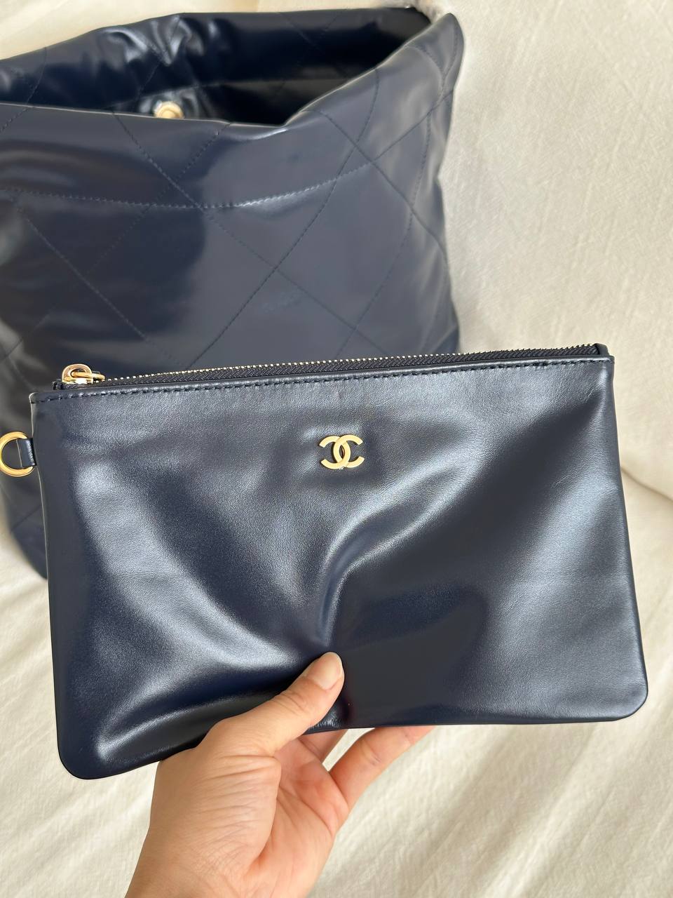 CHANEL 22 Quilted Shiny Calfskin Tote Bag in Navy Blue