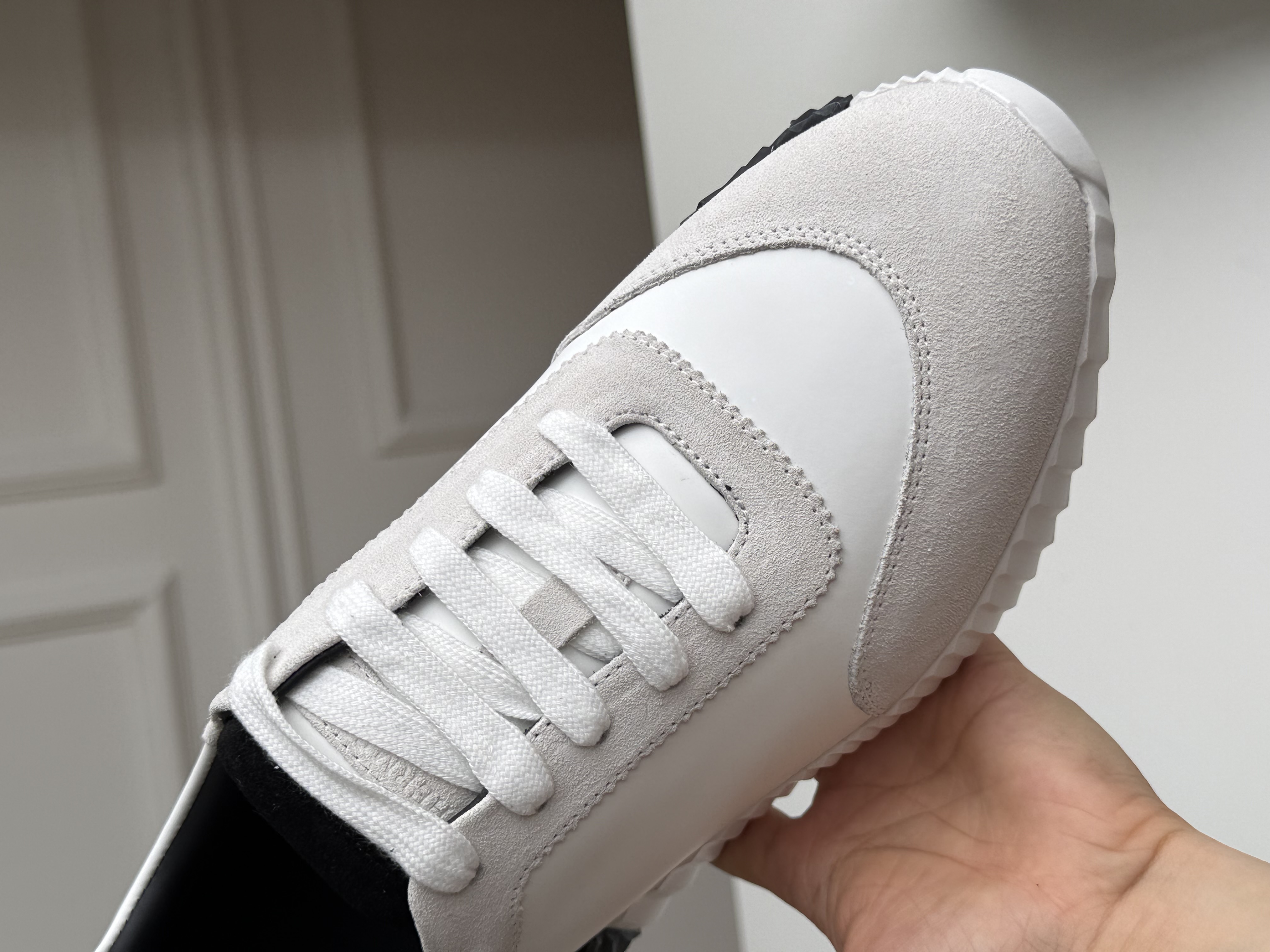 Hermès Bouncing Sneakers in White & Black