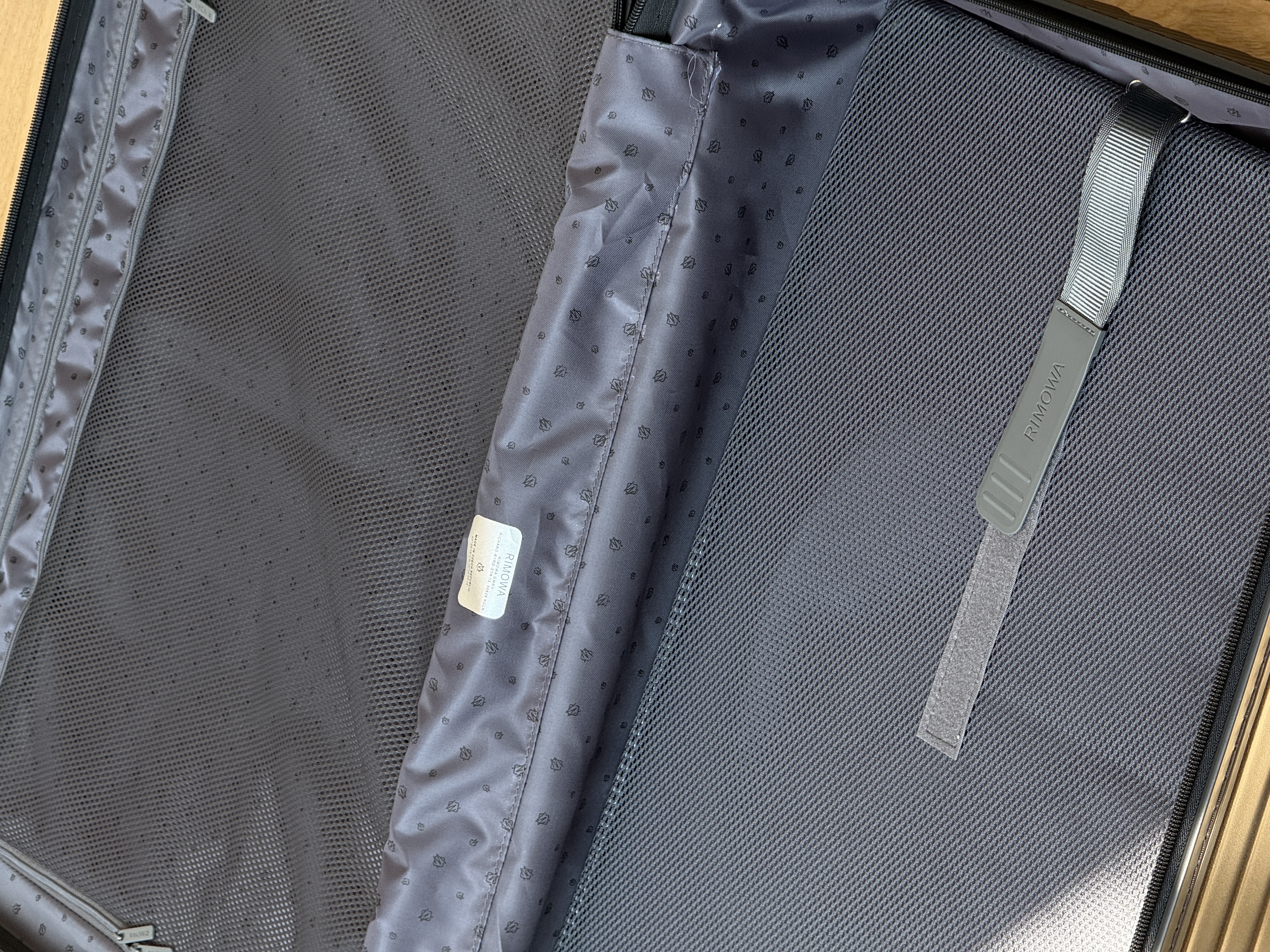 RIMOWA Essential Matte Black Vertical Groove Check-in Luggage