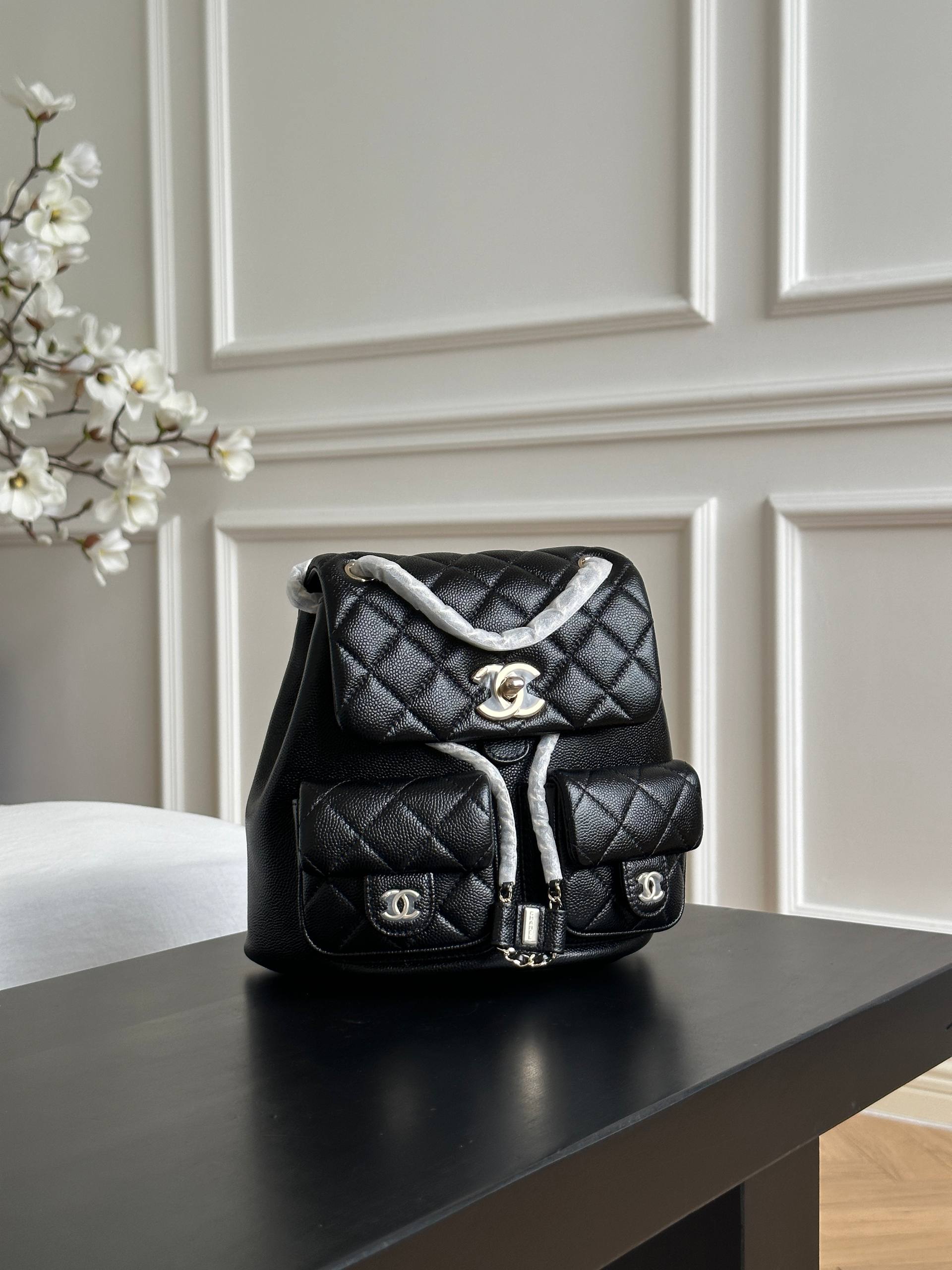 Chanel Black Caviar Quilted Double Pocket CC Drawstring Chain Mini Backpack