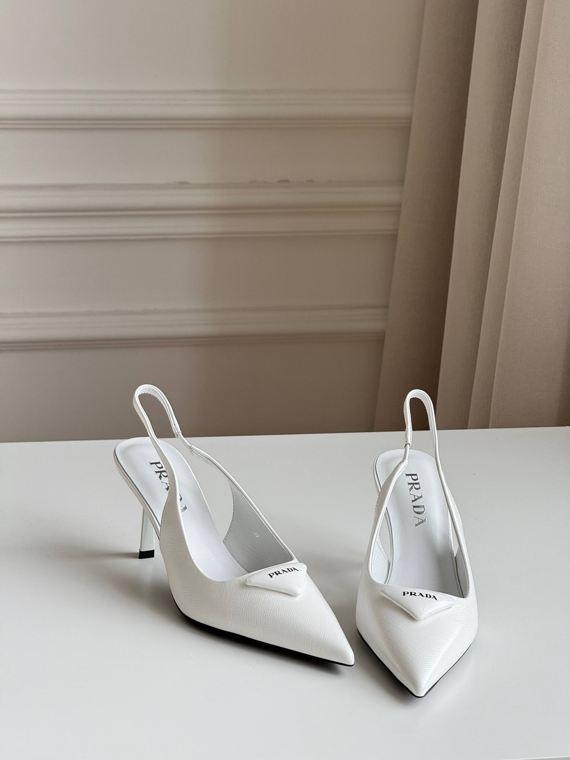 Prada Pointed-Toe Slingback Pumps with Triangle Logo