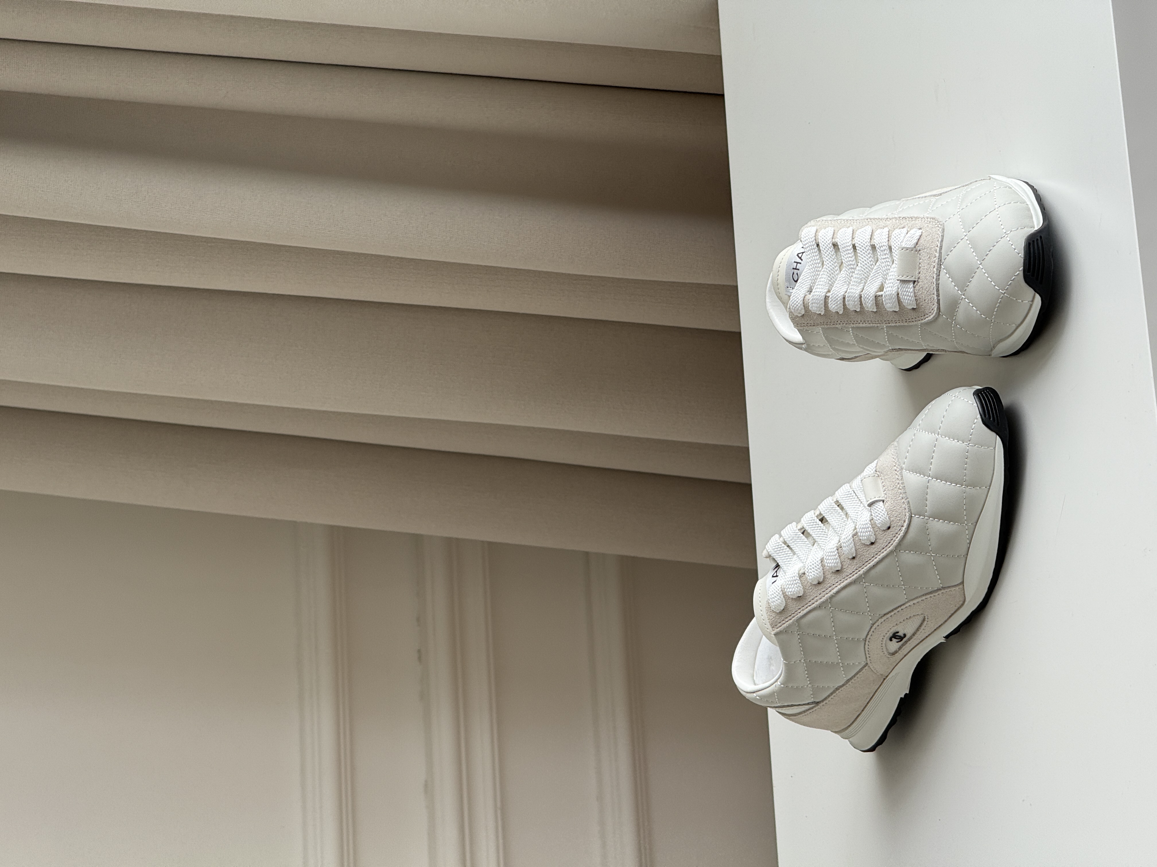 CHANEL Quilted Low-Top Sneakers