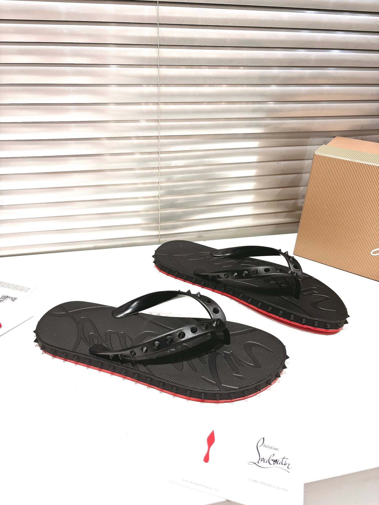 Christian Louboutin Loubi Flip Slide