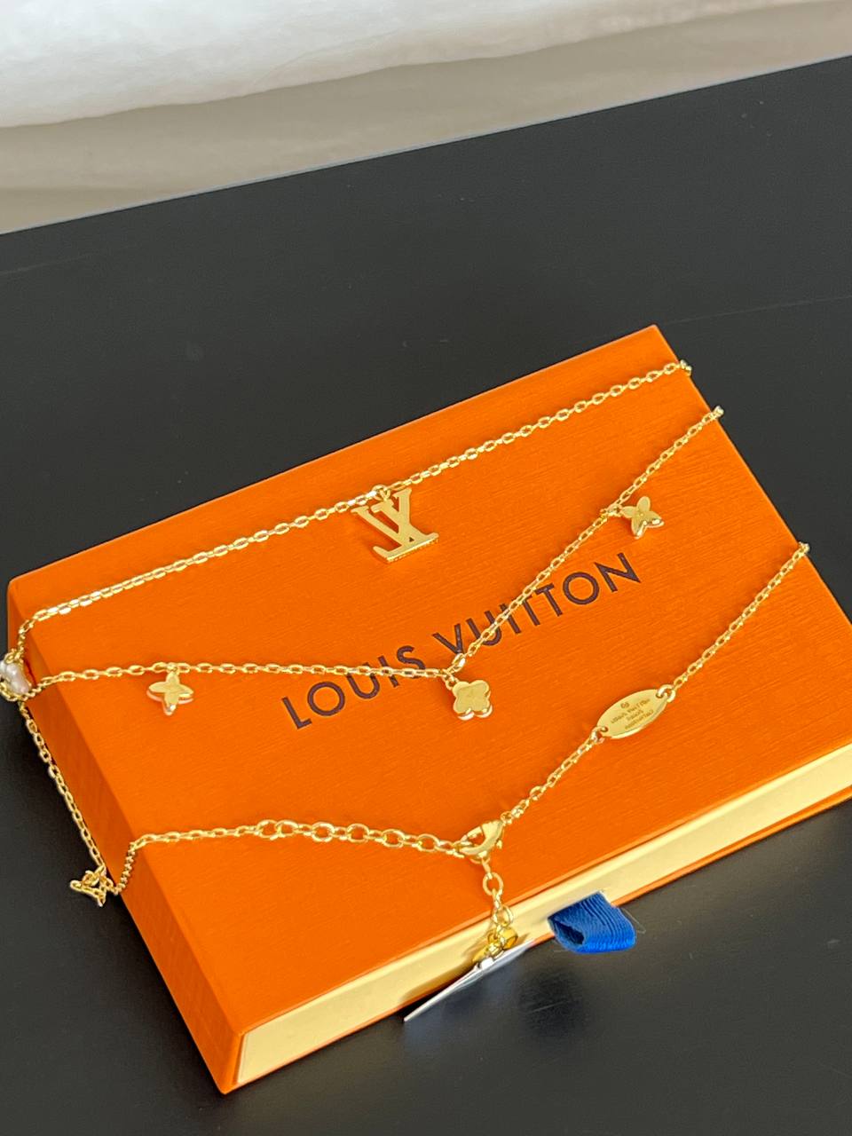 Louis Vuitton Gold Metal Triple Layer Necklace Set With LV Logo, Clover Charms & Pearl Pendant