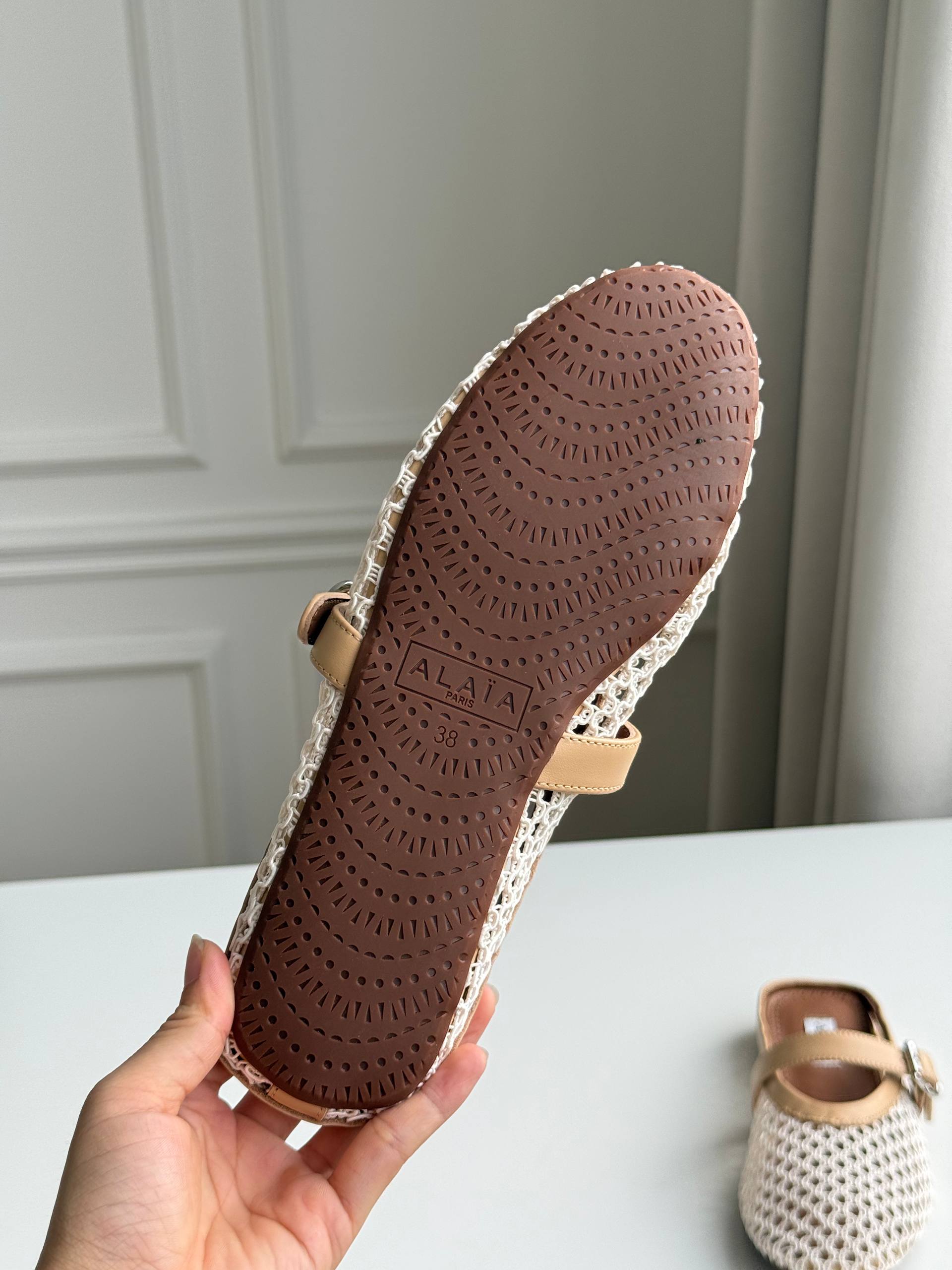 Alaïa Hollow-out Woven Mary Jane Flat Mule Shoes
