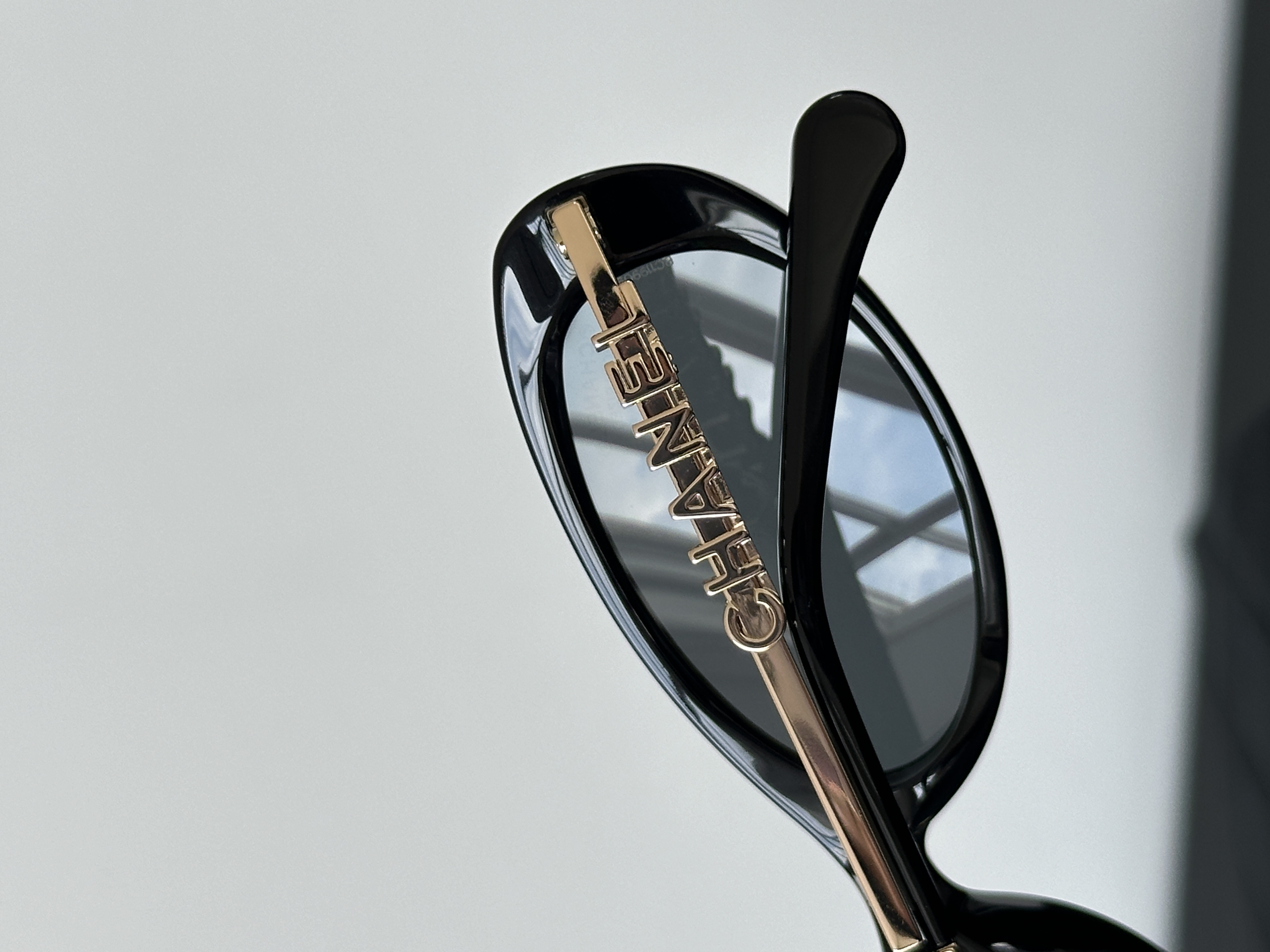Chanel Black Oval Acetate Chain Temple Polarized Sunglasses