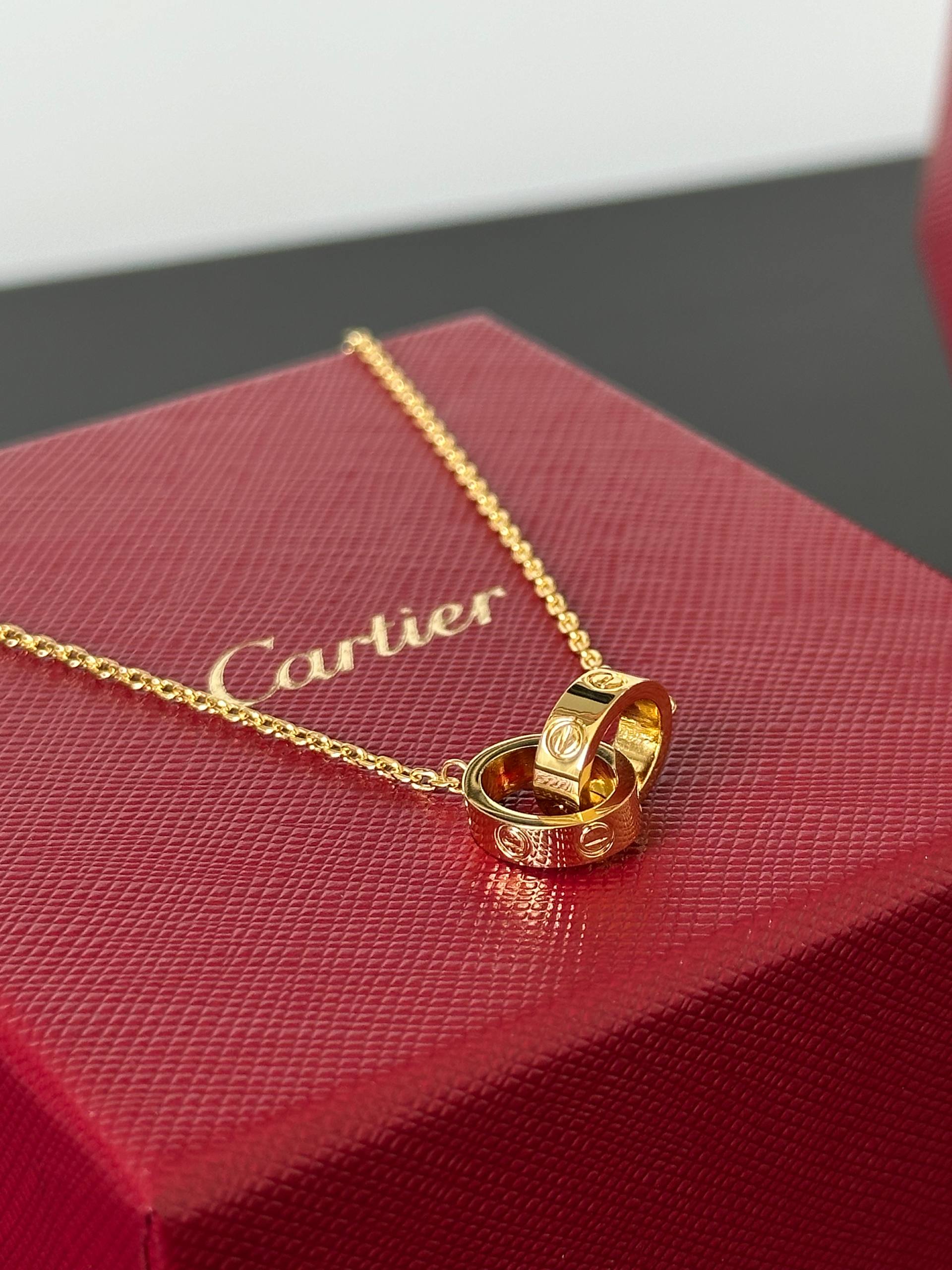 Cartier LOVE Interlocking Two-Ring Yellow Gold Necklace