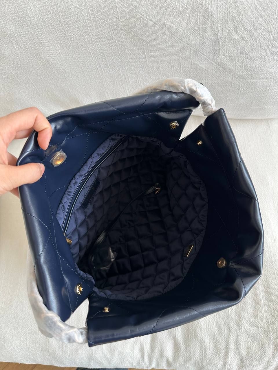 CHANEL 22 Quilted Shiny Calfskin Tote Bag in Navy Blue