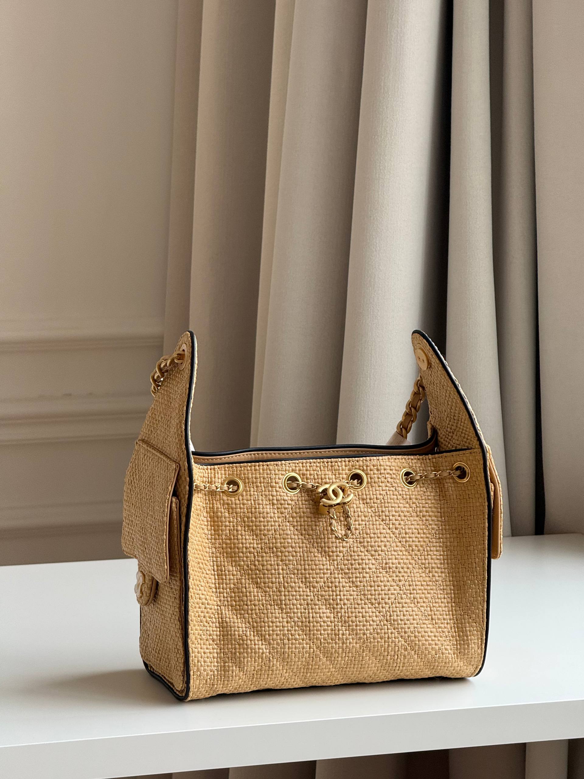 Chanel Quilted Raffia Drawstring Bucket Bag