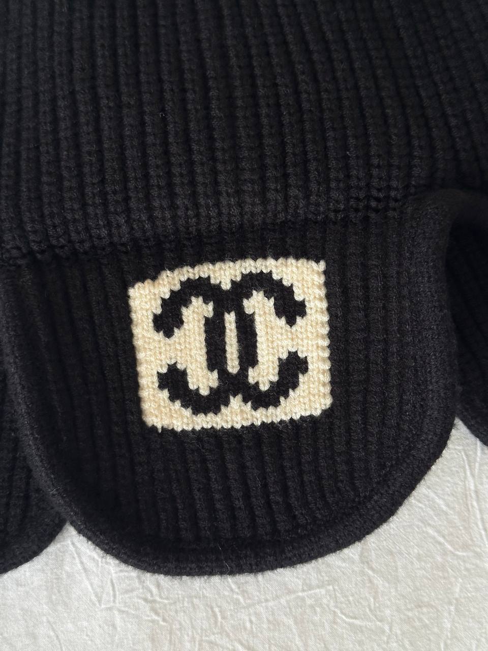 Chanel Black Vertical Rib Knit Ear Flap Hat With Off-white Jacquard CC Logo