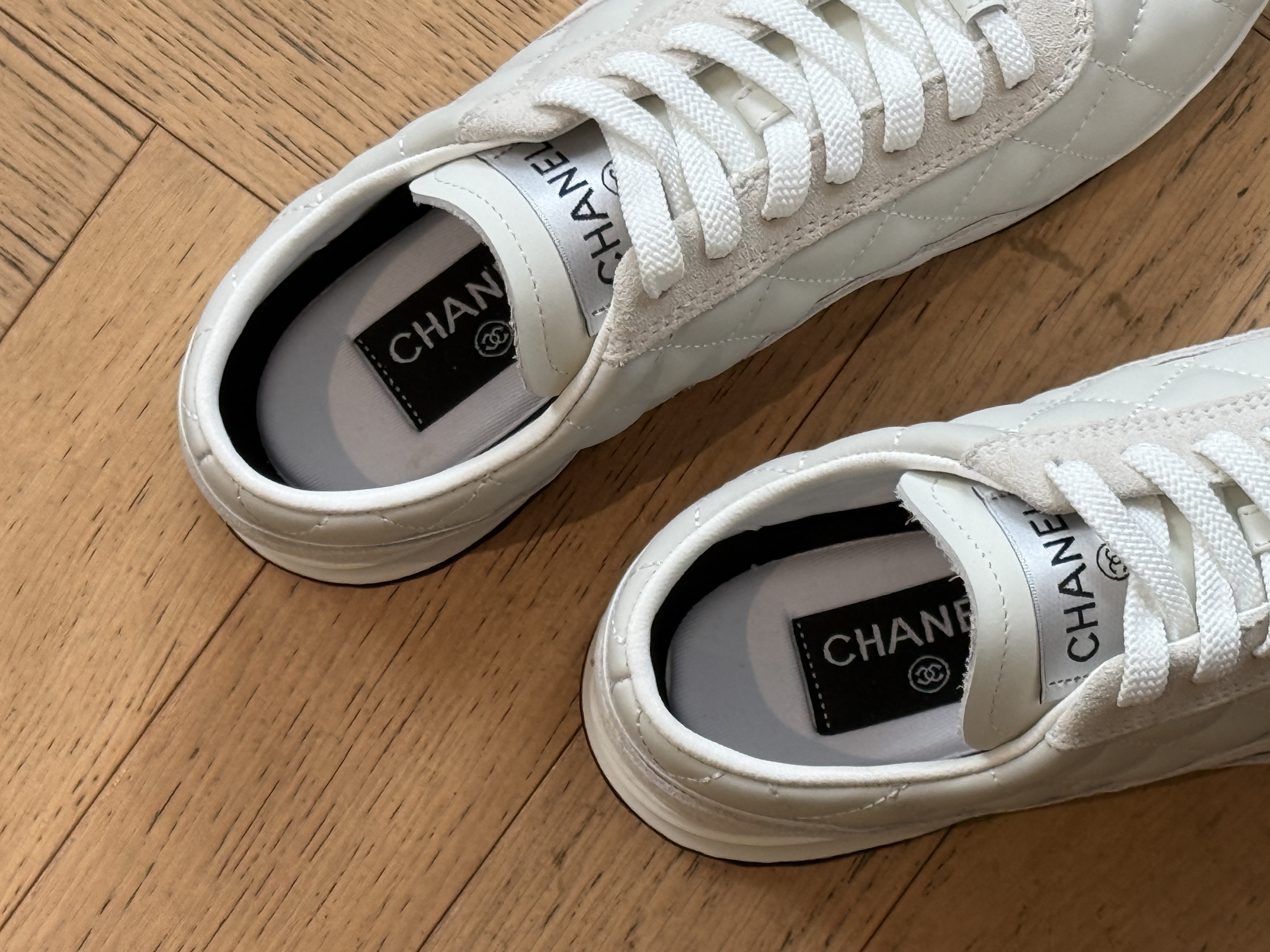 CHANEL Lambskin Quilted German Trainer Sneakers