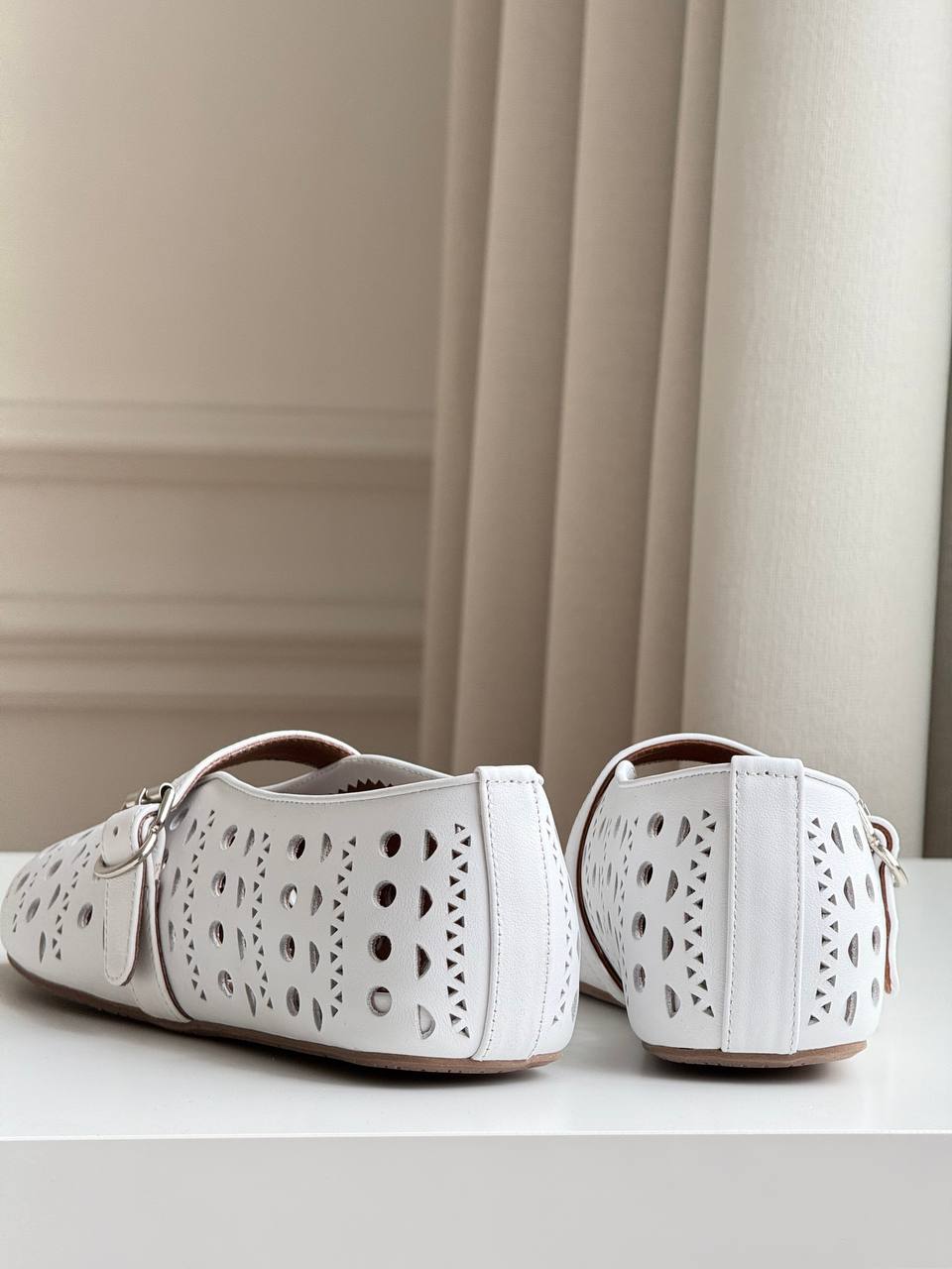ALAÏA Vienne Laser-Cut Leather Mary Jane Ballerina Flats