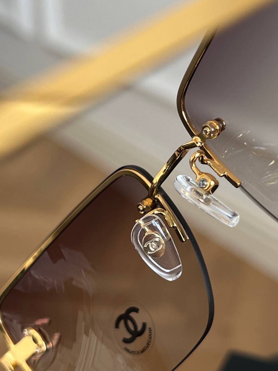 Chanel Gold Rimless Square Sunglasses With Crystal Interlocking CC Logo Gradient Brown Lenses