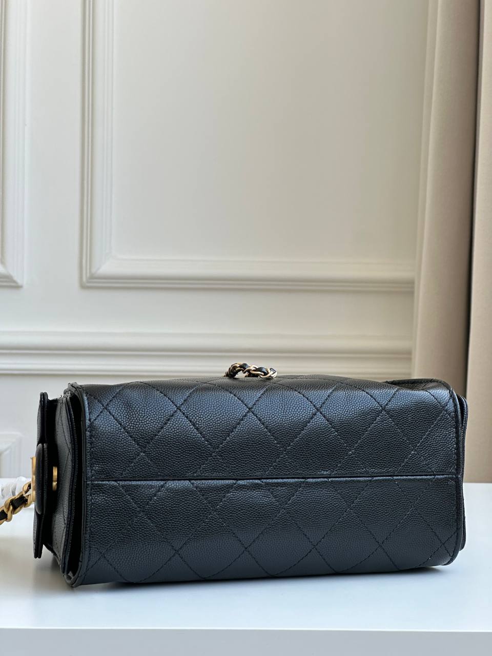 CHANEL Black Caviar Quilted Drawstring Bucket Bag with CC Logo