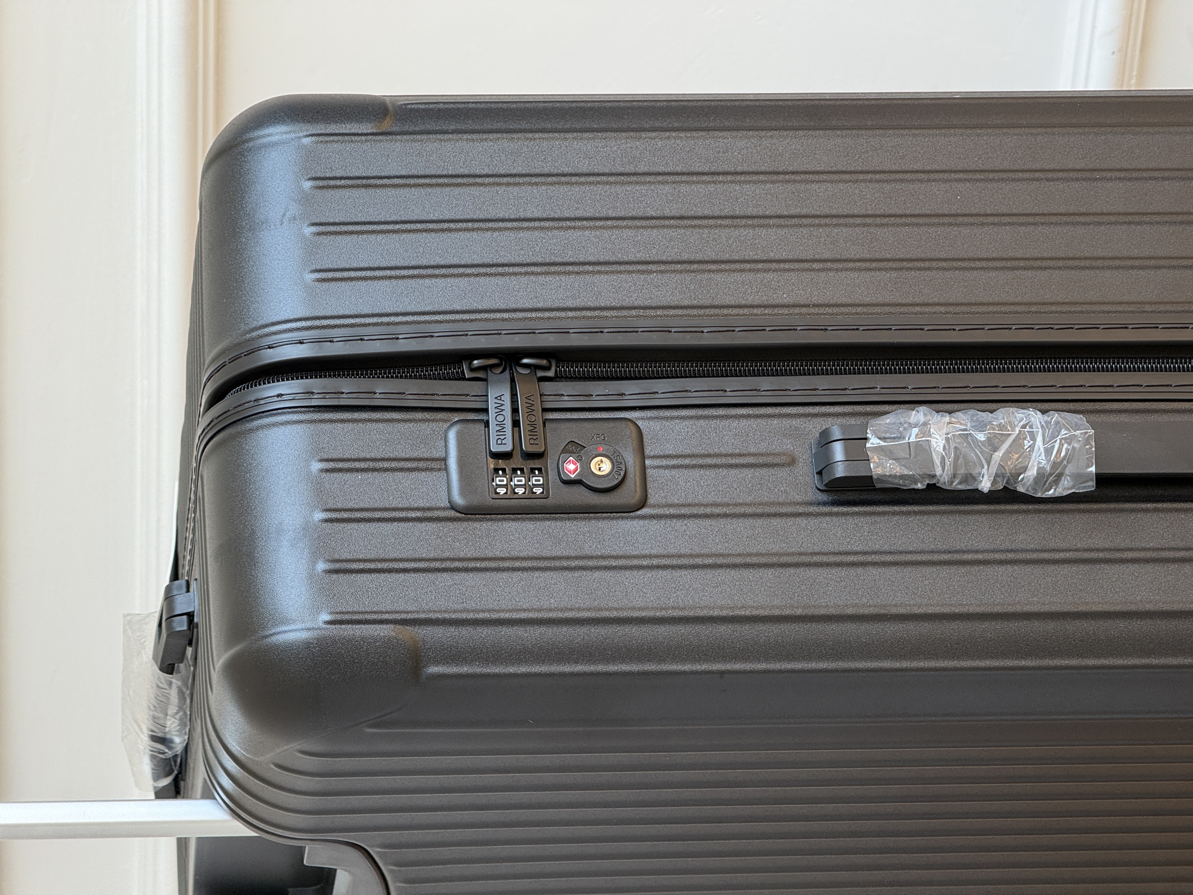 RIMOWA Essential Matte Black Vertical Groove Check-in Luggage