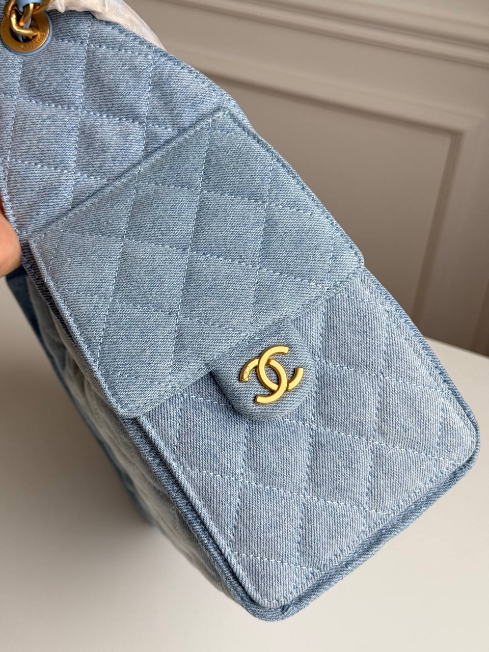 Chanel 25 Quilted Denim Drawstring Bucket Bag