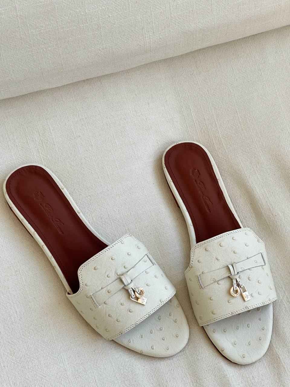 Loro Piana Off-white Ostrich Embossed Leather Bow Lock Flat Slide Sandals