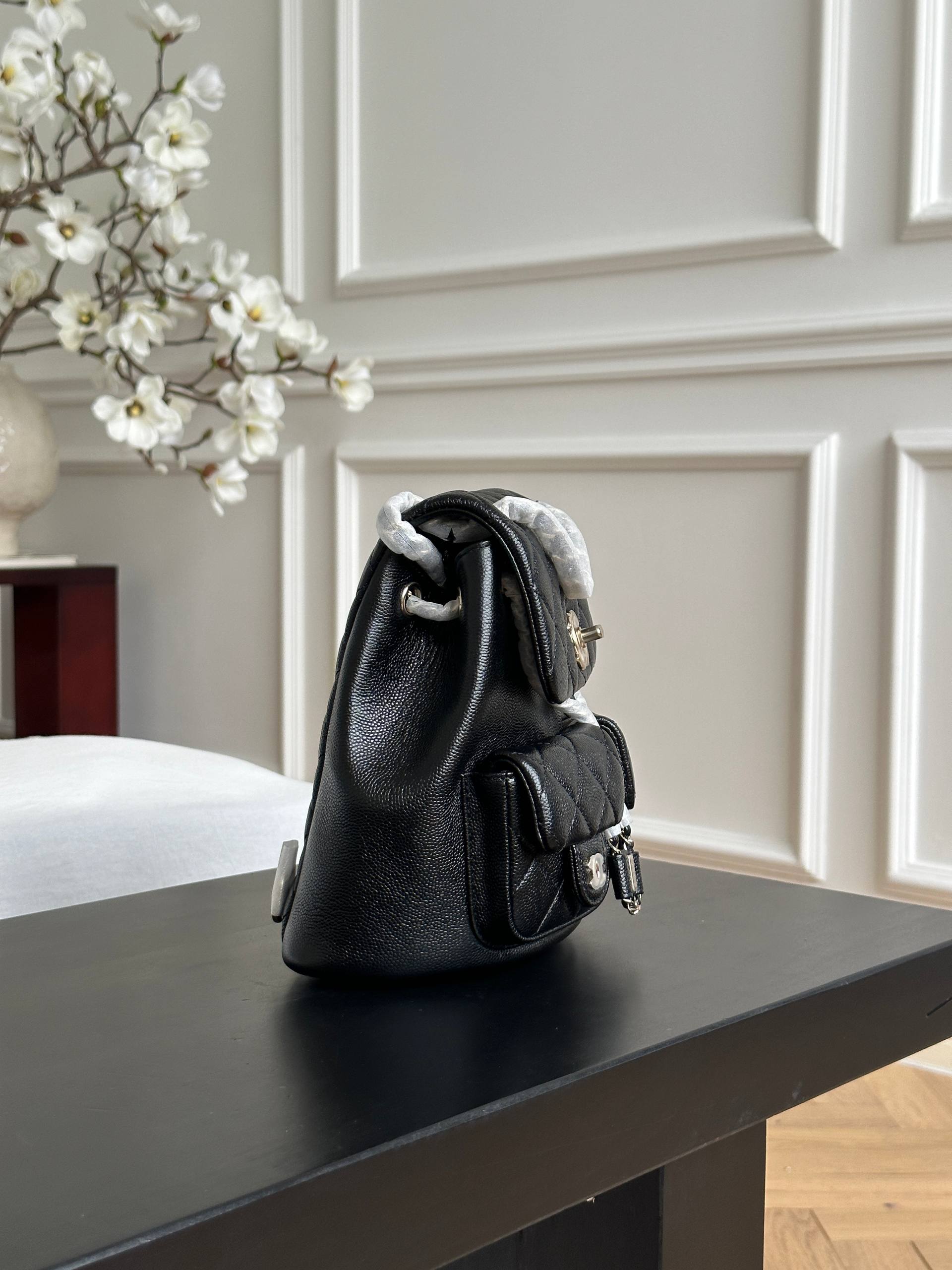 Chanel Black Caviar Quilted Double Pocket CC Drawstring Chain Mini Backpack