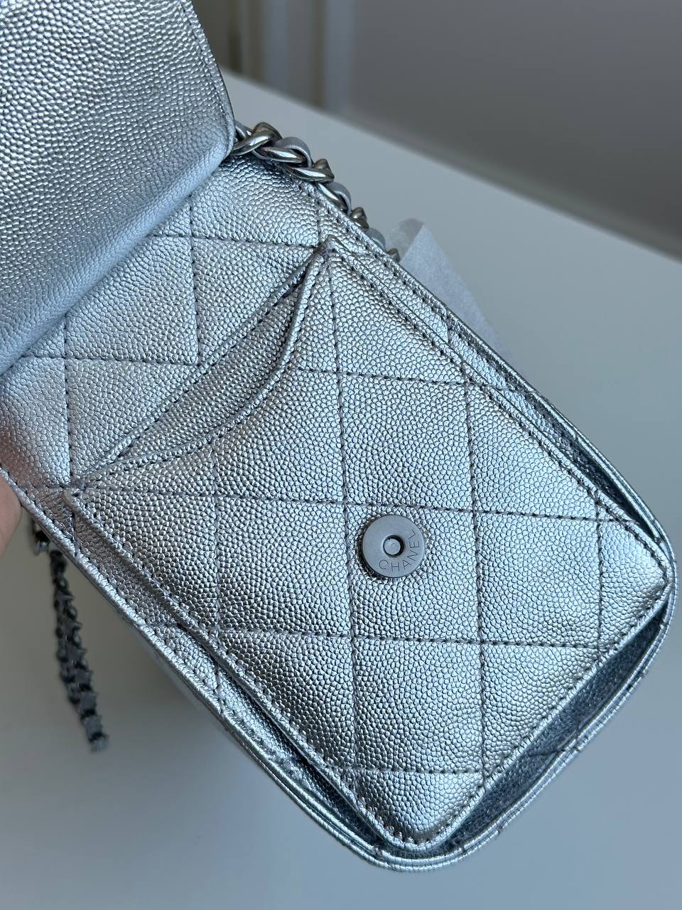 CHANEL Metallic Caviar Quilted Drawstring Bucket Bag