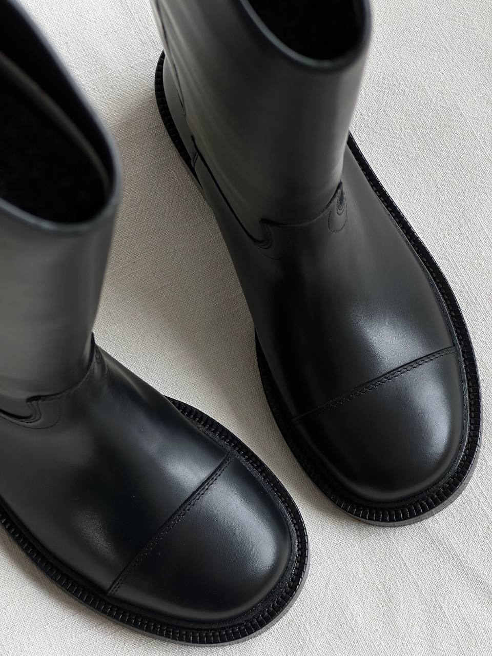 Chanel Black Calfskin Embossed CC Low Heel Knee-High Riding Boots