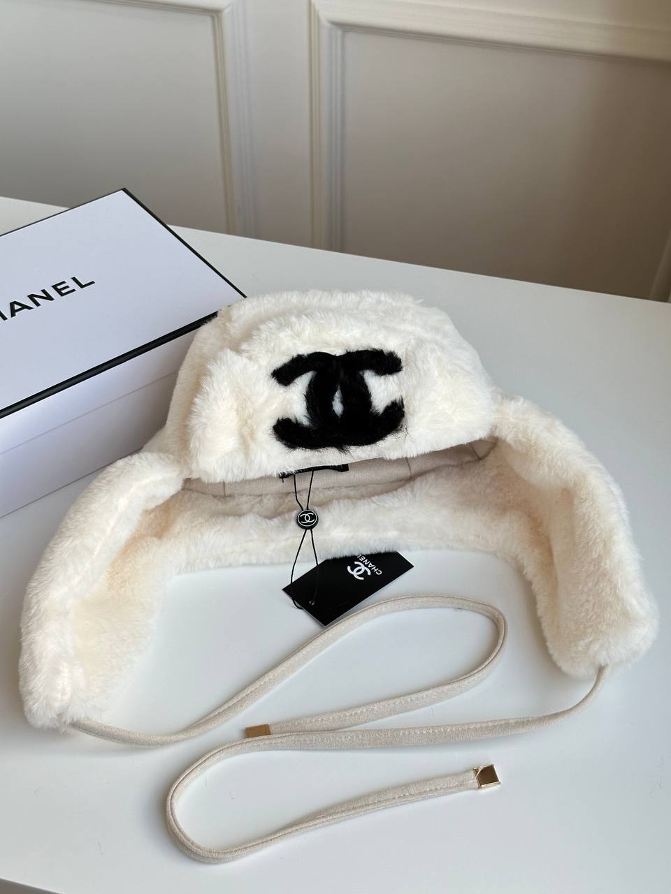 Chanel Off-White Faux Shearling Fur Embroidered CC Ear Flap Trapper Hat