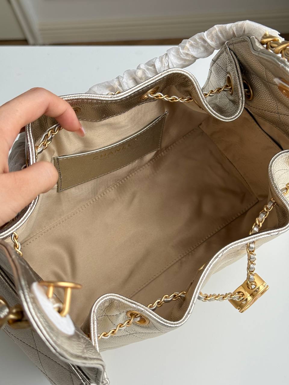 Chanel 25 Metallic Caviar Quilted Drawstring Bucket Bag