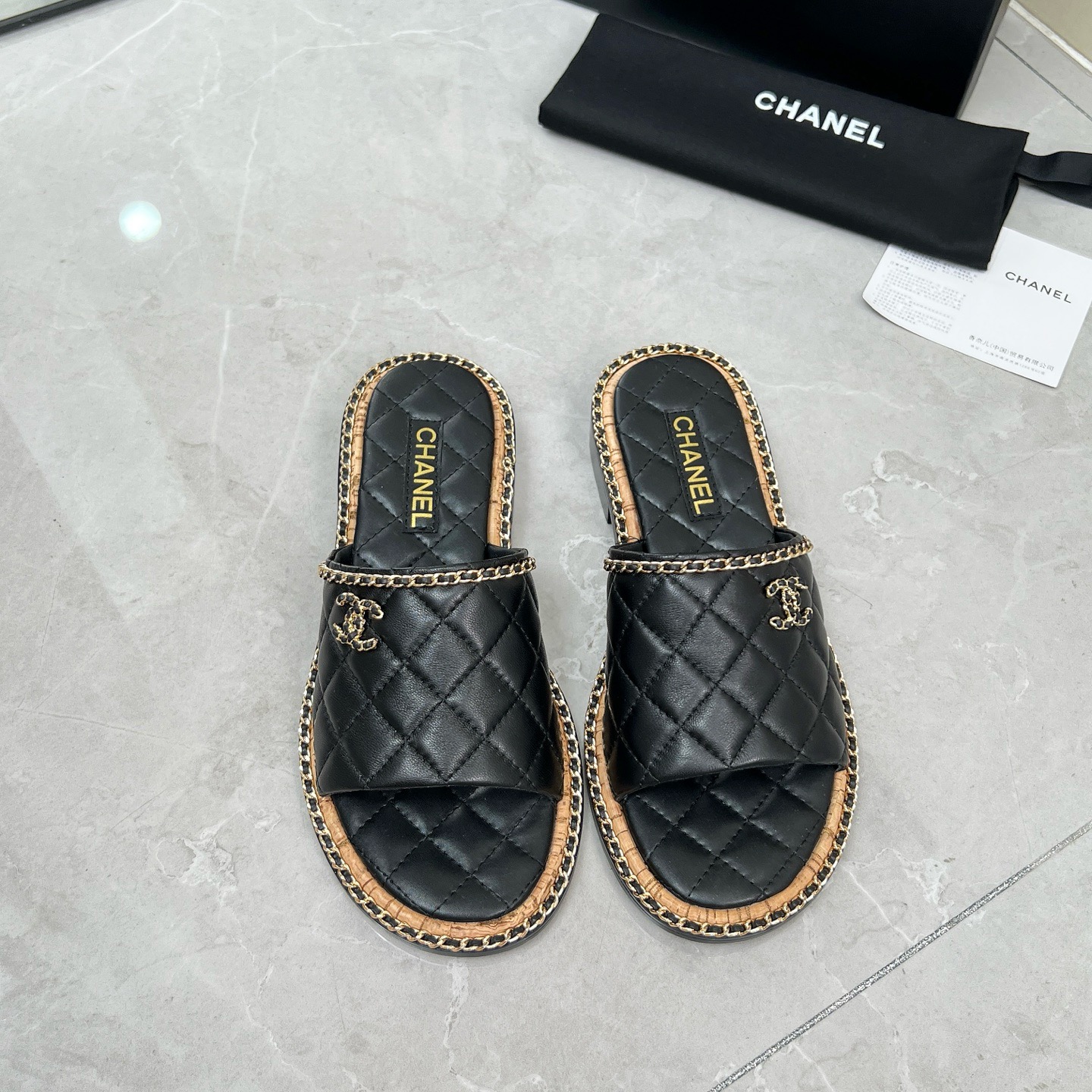 Chanel black leather sandals