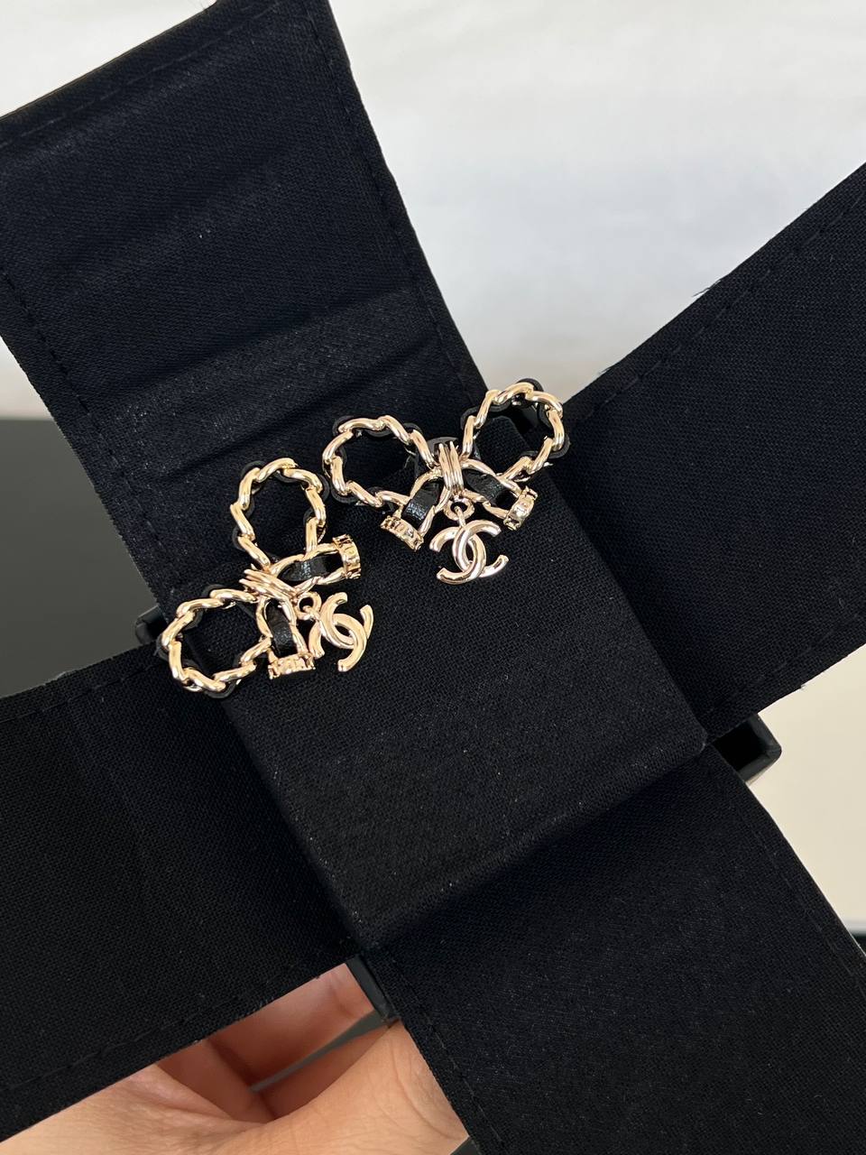 Chanel Leather Interwoven Chain Bow CC Charm Stud Earrings