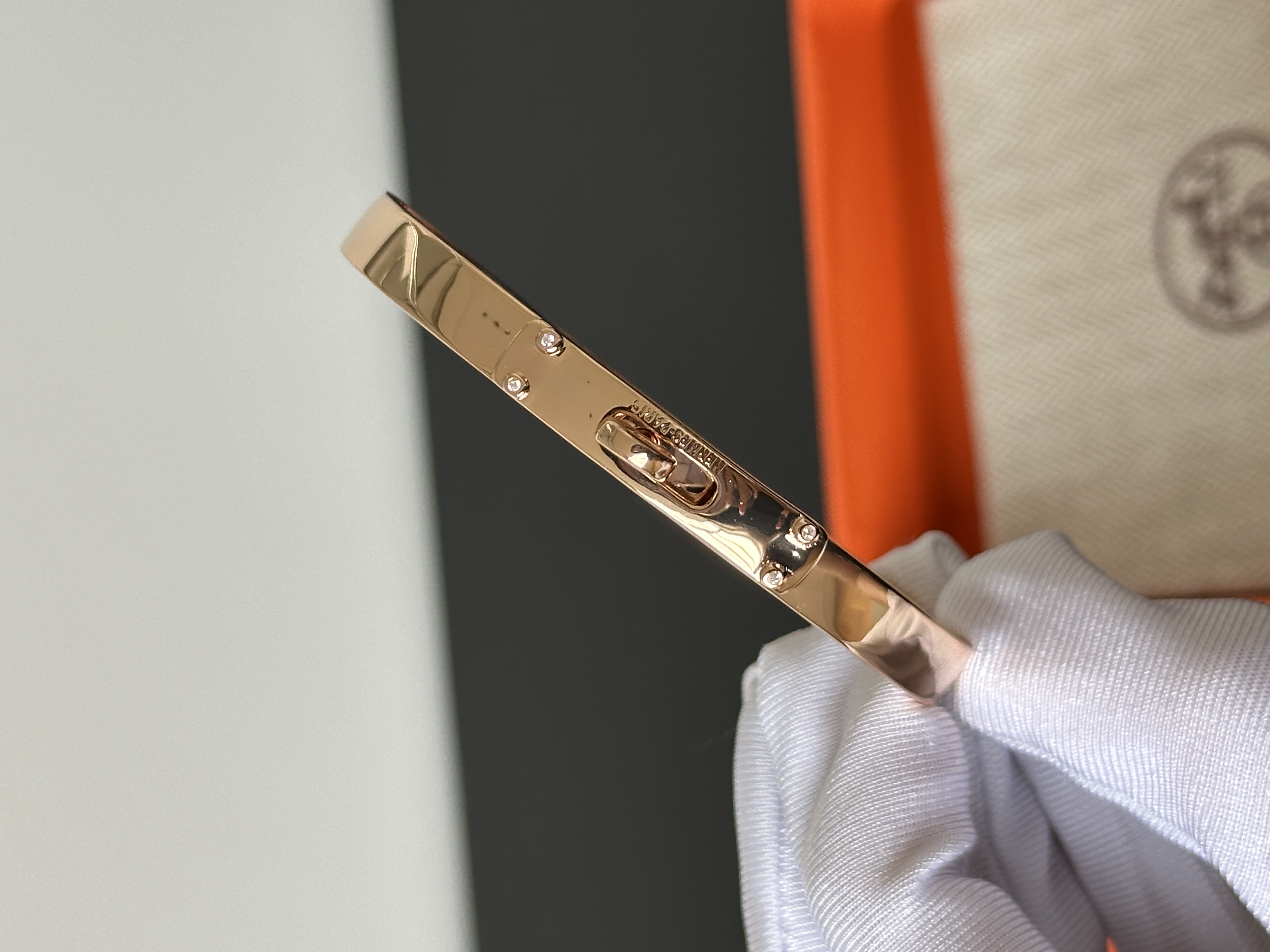 Hermès Kelly Narrow Rose Gold Metal Lock Bangle Bracelet