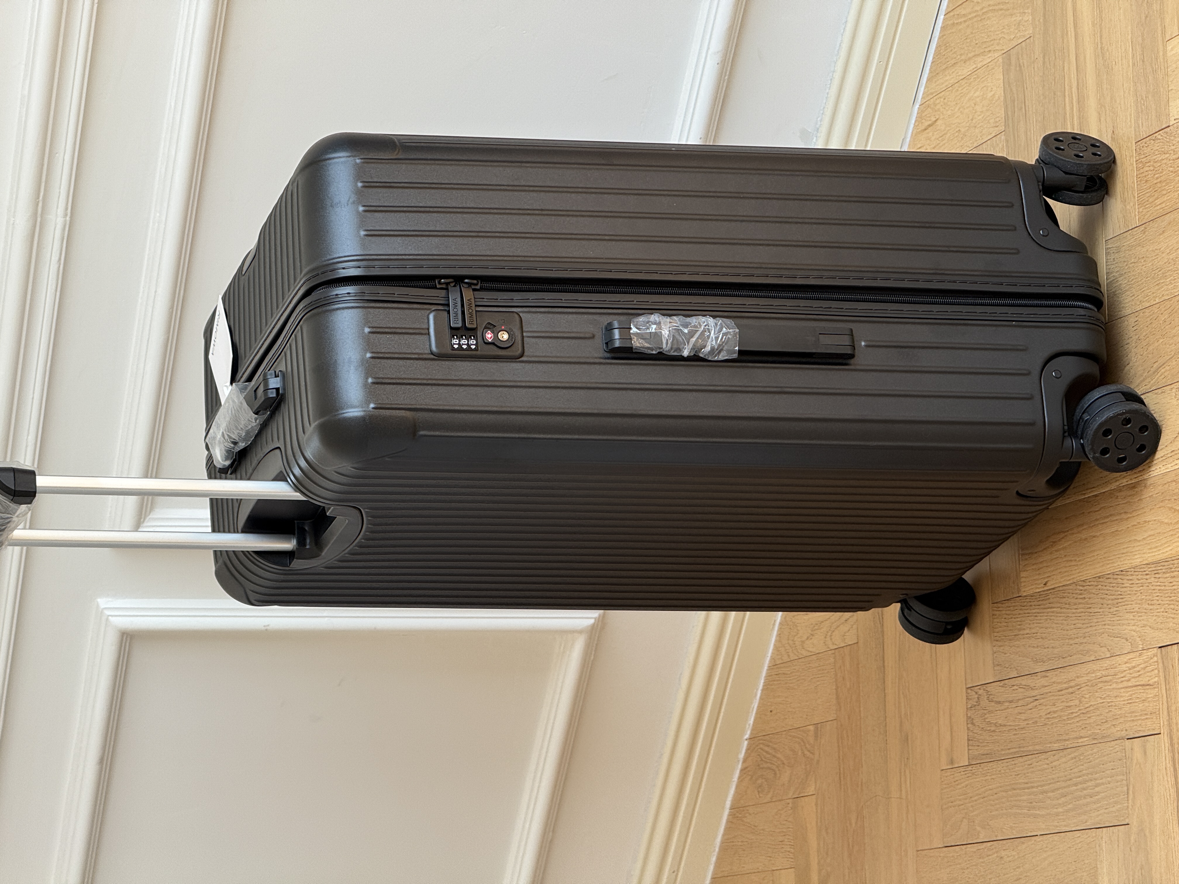 RIMOWA Essential Matte Black Vertical Groove Check-in Luggage