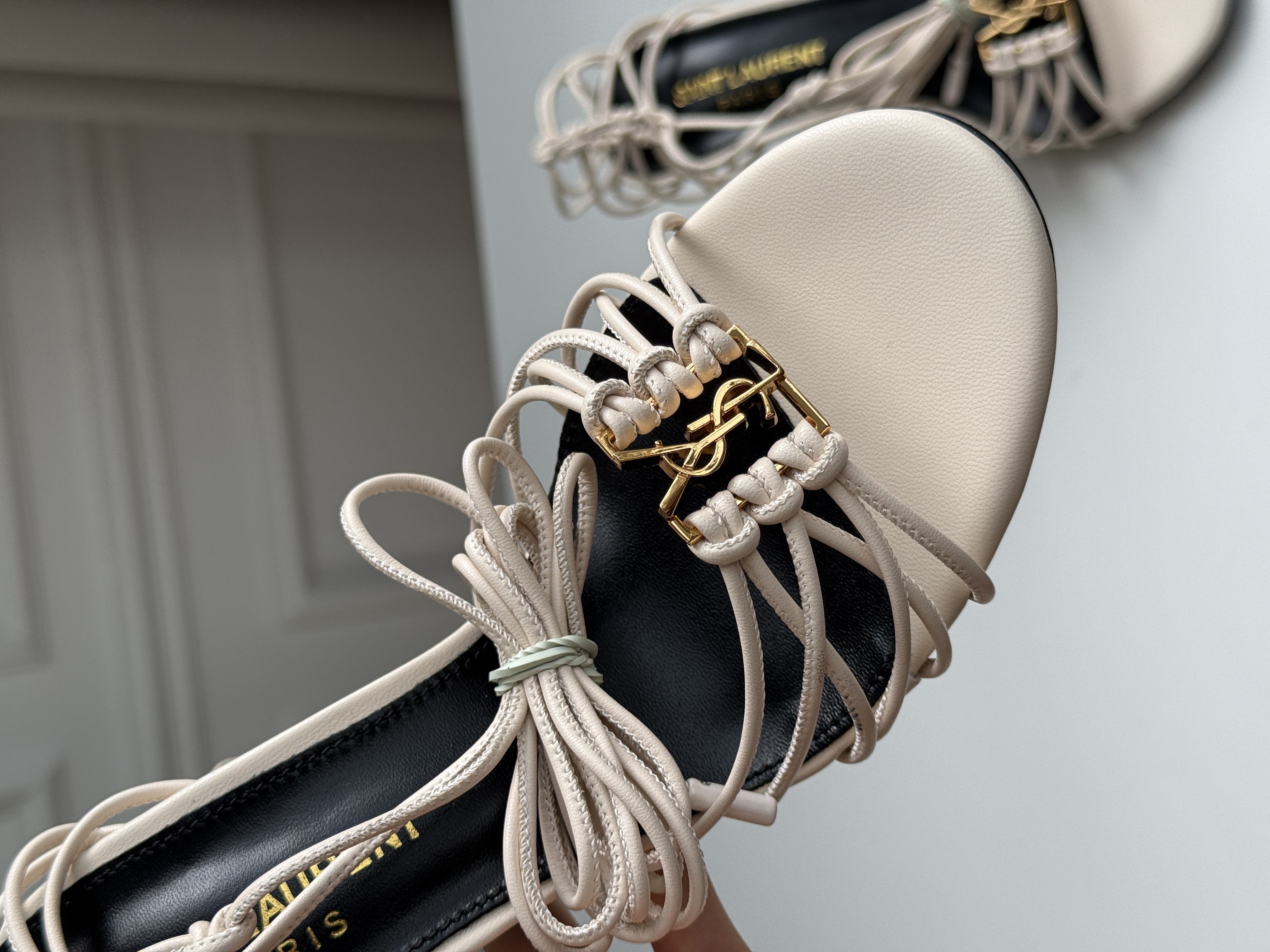 Saint Laurent Off-White Knotted Strappy Stiletto Heel Sandals with YSL Logo