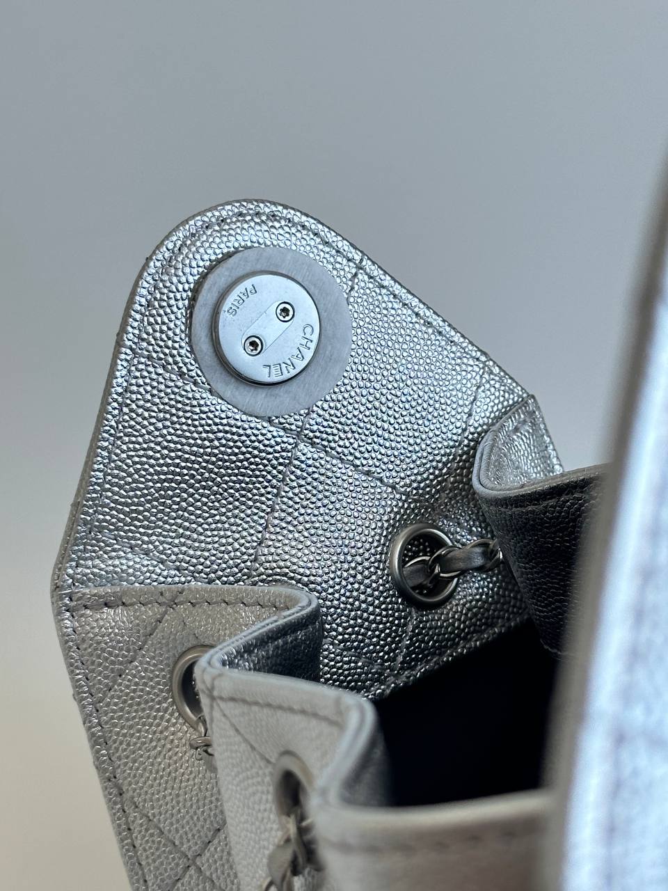 CHANEL Metallic Caviar Quilted Drawstring Bucket Bag