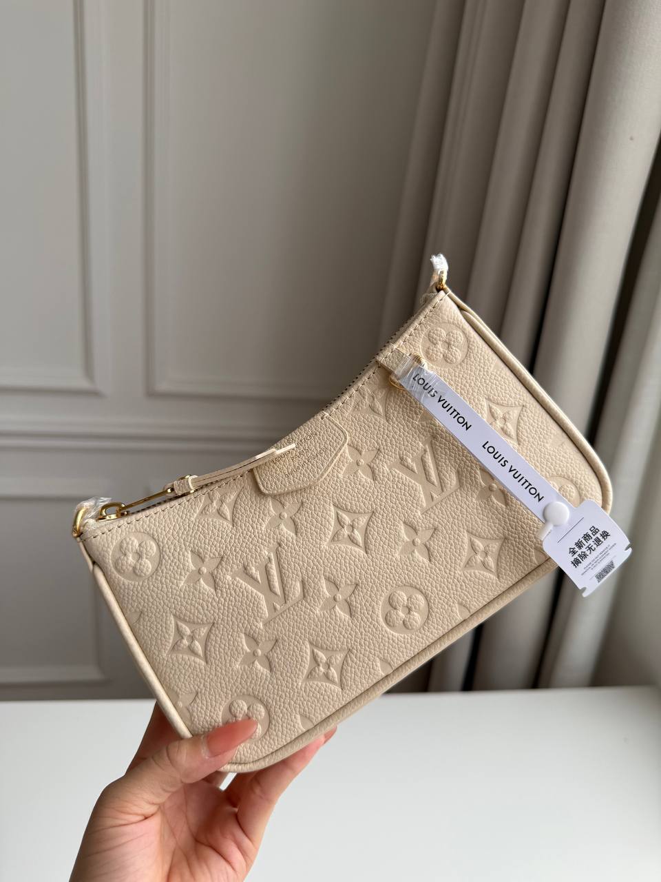 Louis Vuitton Easy Pouch On Strap in Monogram Empreinte Leather