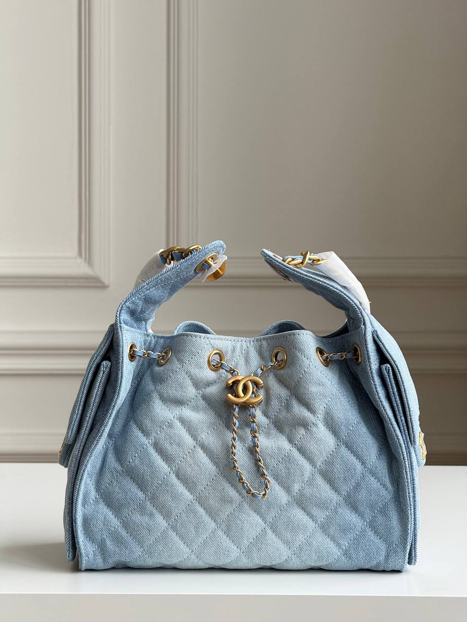 Chanel 25 Quilted Denim Drawstring Bucket Bag