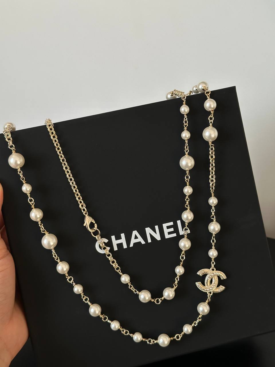 Chanel Long Necklace with Glass Pearls & CC Logos