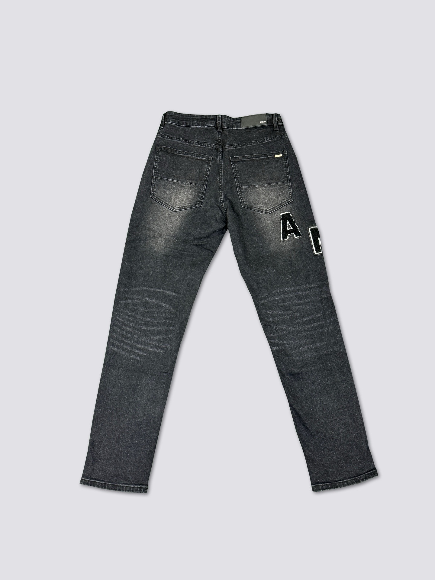 Amiri  embroidered word Logo jeans