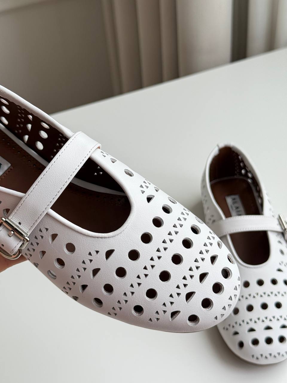 ALAÏA Vienne Laser-Cut Leather Mary Jane Ballerina Flats
