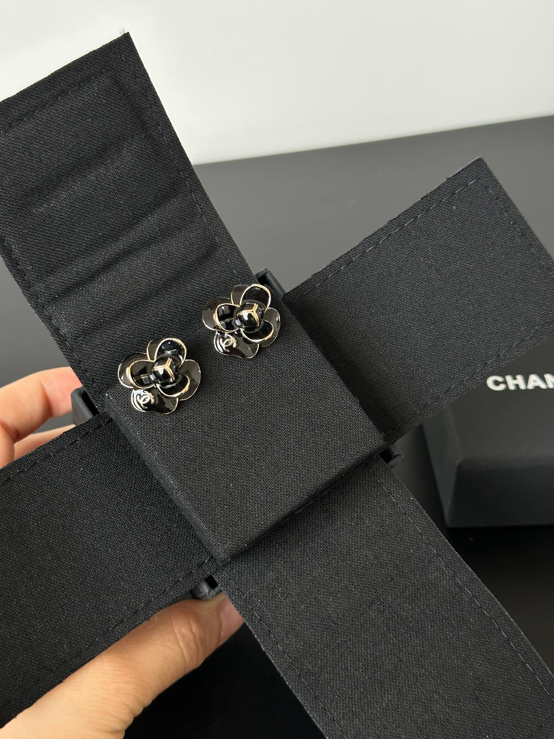 Chanel Black Gold Camellia Stud Earrings