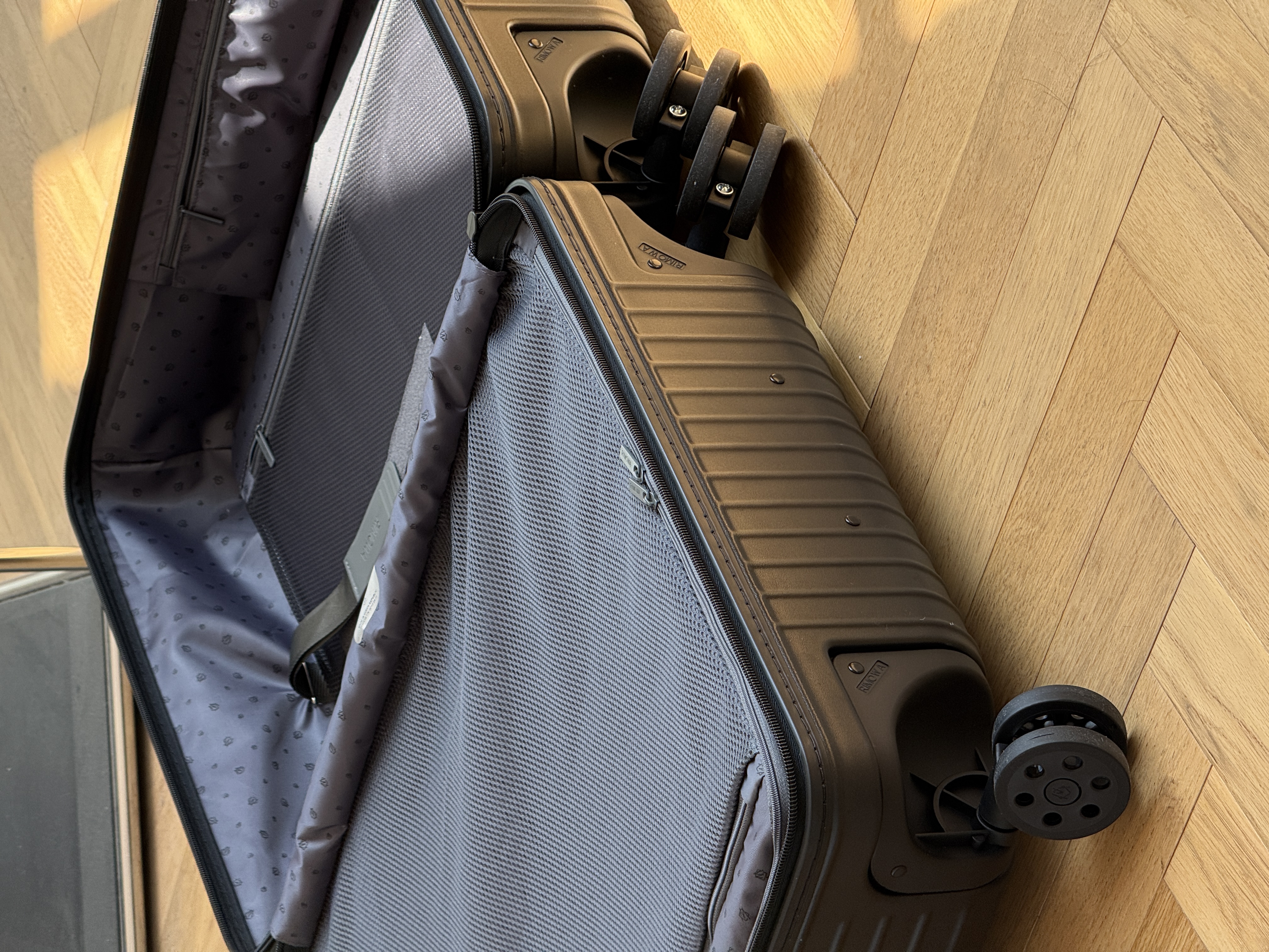 RIMOWA Essential Matte Black Vertical Groove Check-in Luggage