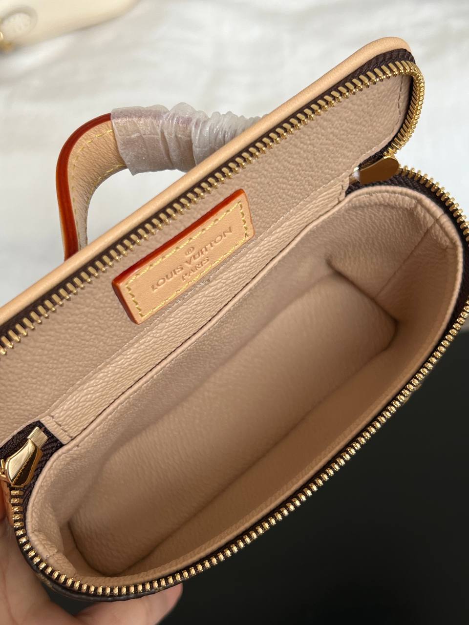 Louis Vuitton Mini Handheld Cosmetic Bag In Classic Monogram Coated Canvas