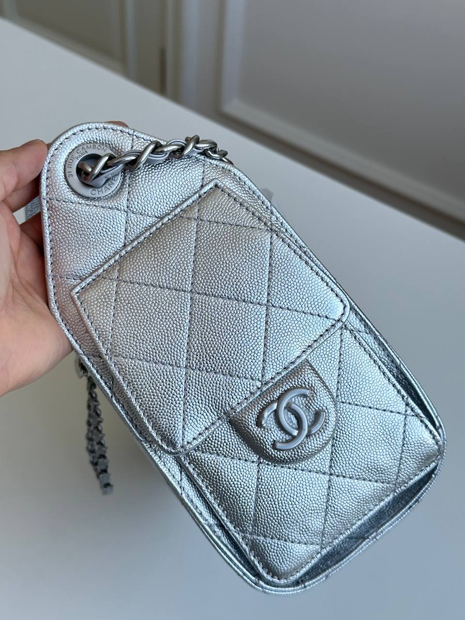 CHANEL Metallic Caviar Quilted Drawstring Bucket Bag