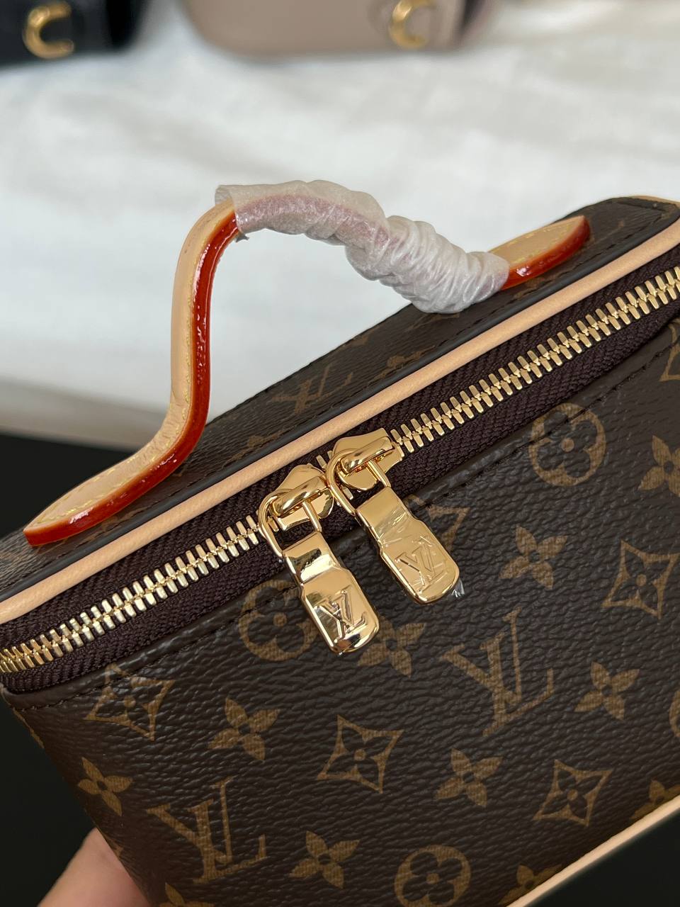 Louis Vuitton Mini Handheld Cosmetic Bag In Classic Monogram Coated Canvas